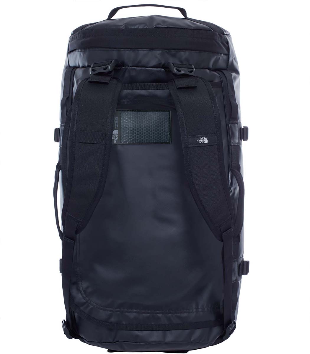 Сумка дорожная The North Face Base Camp Duffel, цвет: черный. T0CWW2JK3T0CWW2JK3 Сумка дорожная The North Face Base Camp Duffel, цвет: черный. T0CWW2JK3T0CWW2JK3Дорожная сумка The North Face Base Camp Duffel - знаменитый экспедиционный баул, который ценят по всему миру за его надежность. У сумки предусмотрен боковой карман на молнии для телефона или необходимых в пути документов, улучшенные эргономичные плечевые лямки, новые мягкие боковые ручки, которые позволяют с удобством переносить (или тащить) тяжелые грузы. Проверенная временем конструкция из нейлона баллистик все так же надежна, как и прежде. Объем: 71 л.