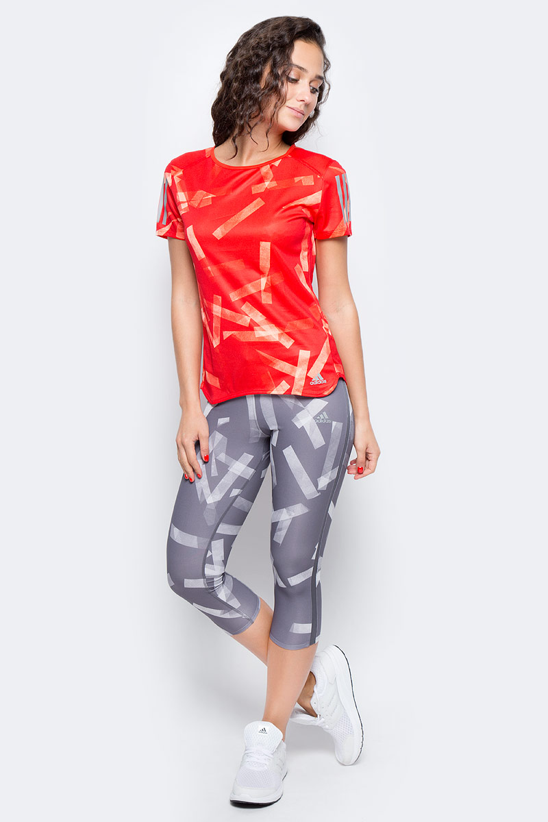 Футболка для бега женская Adidas Rs Q3 Grphc T W, цвет: красный, оранжевый. BS2895. Размер L (48/50)BS2895 Футболка для бега женская Adidas Rs Q3 Grphc T W, цвет: красный, оранжевый. BS2895. Размер L (48/50)BS2895Женская футболка для бега Adidas изготовлена из полиэстера. Модель с круглым вырезом горловины и короткими рукавами, дополненасветоотражающими полосками. Легкая ткань climalite® отводит излишки влаги от кожи, сохраняя ощущение сухости и свежести. Модель полностью повторяет все твои движения.