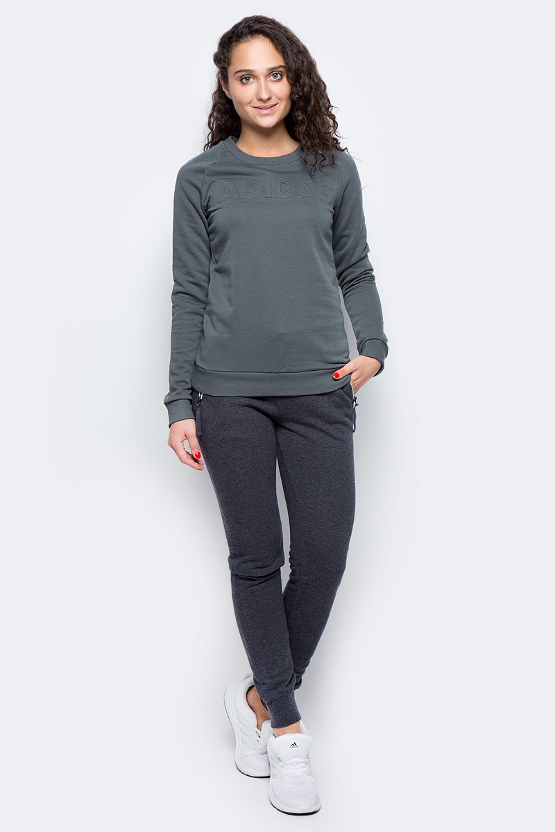 Толстовка женская Adidas Lineage Sweater, цвет: серый. CD1939. Размер M (46/48)CD1939 Толстовка женская Adidas Lineage Sweater, цвет: серый. CD1939. Размер M (46/48)CD1939Женская толстовка Adidas изготовлена из хлопка с добавлением полиэстера. Модель с круглым вырезом горловины и длинными рукавами, дополнена тисненной надписью на груди. . Рукава реглан обеспечивают свободу движений. Рифленые манжеты и нижний край удерживают модель на месте.