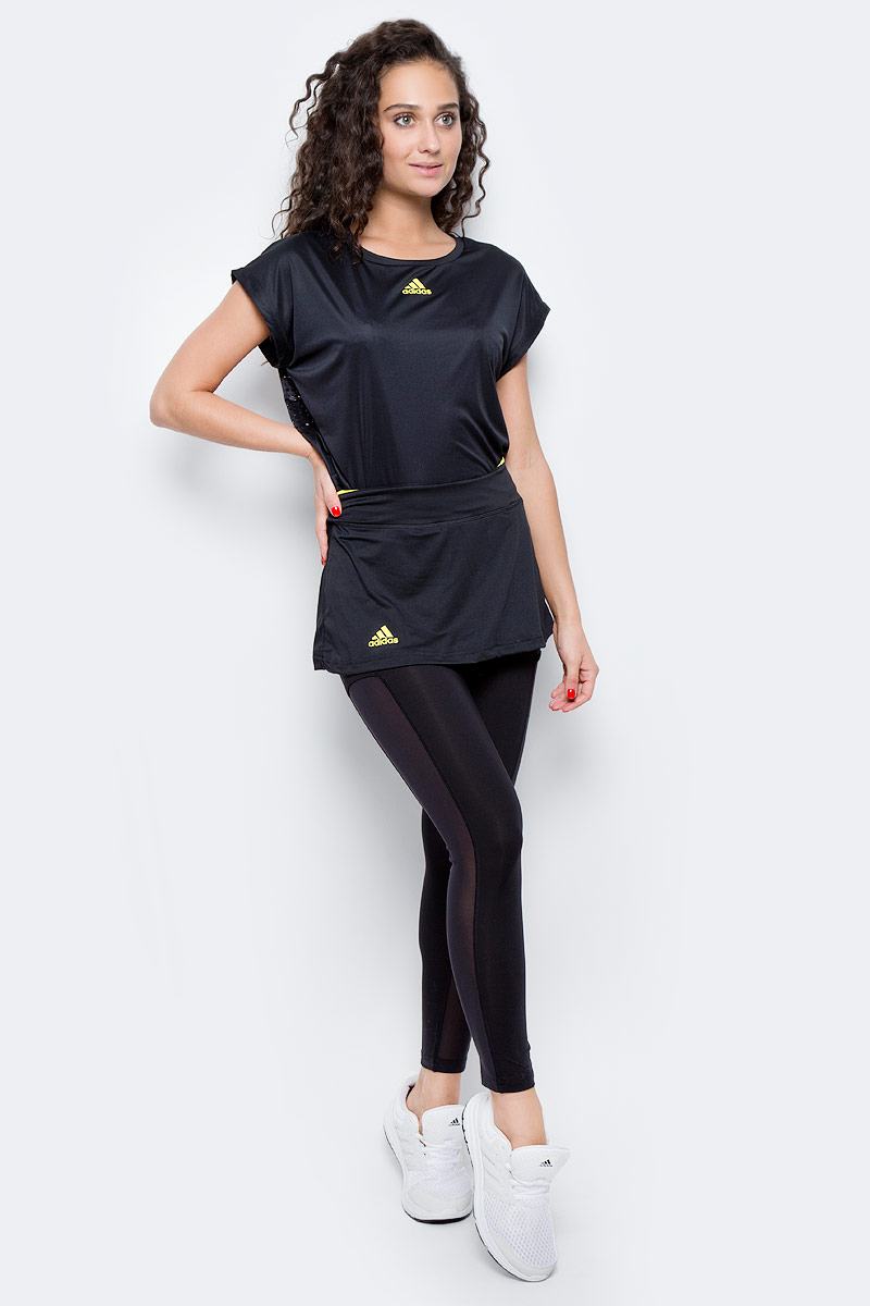 Юбка-тайтсы 2 в 1 для тенниса женская Adidas Us Series Leg, цвет: черный. BP9394. Размер XS (40/42)BP9394 Юбка-тайтсы 2 в 1 для тенниса женская Adidas Us Series Leg, цвет: черный. BP9394. Размер XS (40/42)BP9394Женская юбка - тайтсы Adidas выполнена из высококачественного материала. Леггинсы укороченной длины,дополнены сетчатыми вставками по бокам,для повышенной вентиляции. Юбка украшена контрастной вставкой по верхнему краю пояса. Эластичный тонкий трикотаж, облегающий крой и широкий пояс подчеркивают изящность фигуры. Технология climacool® эффективно отводит излишки влаги, сохраняя чувство свежести на протяжении всего дня.