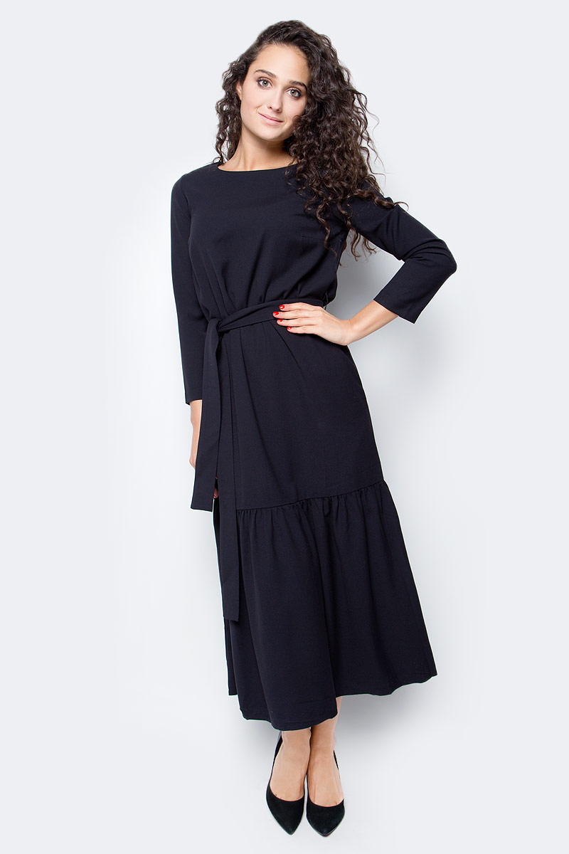 Платье Baon, цвет: черный. B457501_Black. Размер L (48)B457501_Black Платье Baon, цвет: черный. B457501_Black. Размер L (48)B457501_BlackБыть ни на кого не похожей, проявлять свою индивидуальность и безупречный вкус - в таком наряде вы легко справитесь с поставленной задачей! Платье от Baon миди-длины имеет прямой крой и широкую оборку, расположенную вдоль нижней части изделия. При желании вы сможете создать приталенный силуэт, используя завязывающийся пояс. Платье имеет два кармана по бокам.
