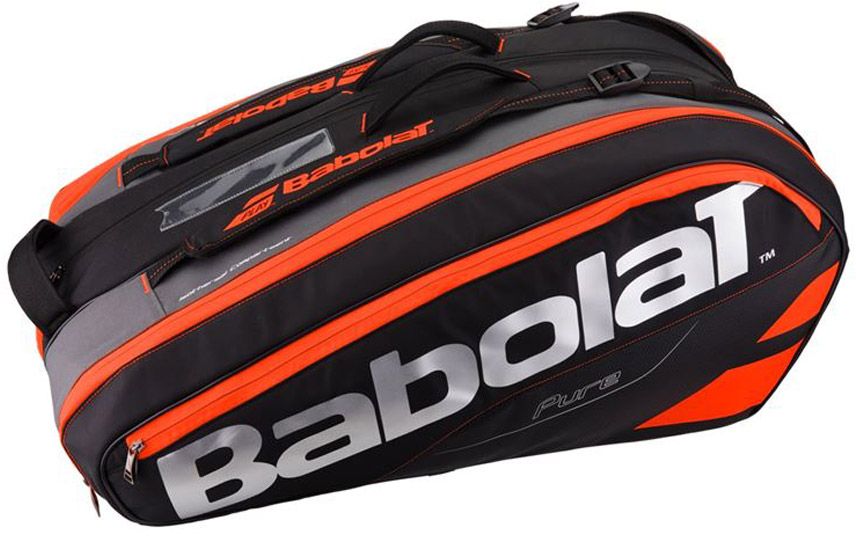 Чехол для теннисных ракеток Babolat Pure, на 12 ракеток, цвет: красный751133 Чехол для теннисных ракеток Babolat Pure, на 12 ракеток, цвет: красный751133Чехол для теннисных ракеток Babolat Pure с тремя основными отделениями для 12 ракеток, два отделения из которых с защитой термоизоляции, которое предотвращает потерю натяжения струн. На внешней стороне чехла отделение на молнии с двумя внутренними карманами и с сумкой для обуви. С другой стороны чехла есть также плотное отделение на молнии, которое защитит хрупкие вещи. Есть вентилируемое отделение для обуви. Есть две ручки, для переноски чехла, одна расположена с верху, другая с боку чехла. Регулируемые плечевые ремни.Такой теннисный чехол выбор профессиональных теннисистов таких как: David Ferrer,Fabio Fognini,Victor Estrella Burgos.Отделения: 3 главных отделения, 2 для аксессуаровВместимость: 12 ракетокРазмеры: 75 x 48 x 32 смОбъём: 67 л