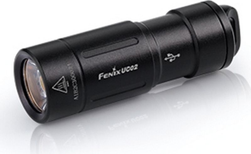 Фонарь ручной Fenix UC02, цвет: черныйUC02bk Фонарь ручной Fenix UC02, цвет: черныйUC02bkОписание фонаря Fenix UC02 Cree XP-G2 S2:Компания Fenix порадовала всех покупателей выпуском еще одной повседневной модели фонаря, которая получила название Fenix UC02. Он работает со светодиодом XP-G2 S2 (одним из самых новых от компании Cree) и способен обеспечивать яркость на уровне 130 люмен. Такого света достаточно, чтобы обеспечить видимость в радиусе 48 метров. Доступен пользователям и более экономный режим на 10 люмен. В таком варианте освещения, луч будет достигать дальности 14 метров. Обращаем ваше внимание, что для этого диода заложен срок службы не менее 50 тысяч часов, принимая во внимание только время работы. Поэтому модель Fenix UC02 действительно можно считать надежной.Свет этого фонаря поддерживает аккумулятор литий-ионного типа 10180. Чтобы пользователю не приходилось искать подходящий вариант отдельно, в комплект производители включили качественный фирменный элемент питания ARB-L10-80. Для него возможна перезарядка с помощью обыкновенного зарядного устройства, а также кабеля USB с микро-разъемом. Аккумулятор имеет защиту от избыточной зарядки и разрядки, а сам фонарь — от переполюсовки.Для управления работой фонаря используется поворотное кольцо ближе к его голове. С помощью этой технологии происходит и включение-выключение, и выбор нужного режима освещения.Важной особенностью модели Fenix UC02 является корпус из алюминия, поверхность которого подвергнута жесткому анодированию. Эта оболочка отлично защищает его от механического повреждения, выдерживая даже падение на камень примерно с метровой высоты. А скрупулезный подход к сборке позволил добиться полной изоляции корпуса от пыли и воды. Этот показатель соответствует требованиям норм IP-68, принятым на международном уровне.Особенности:практичный фонарь-брелок;максимальная яркость - 130 люмен;на выбор имеется 2 режима работы;фонарь освещает пространство радиусом 48 метров;используется белый диод XP-G2 S2 (Cree);период работы диода — 50 000 часов;используется 1 аккумулятор 10180;функция зарядки через USB;корпус сделан из алюминия;закаленное стекло линзы;фонарь совершенно водонепроницаемый;Гарантия: Фонарь-брелок Fenix UC02 продается с гарантией на 5 лет, которую предоставляют производители.