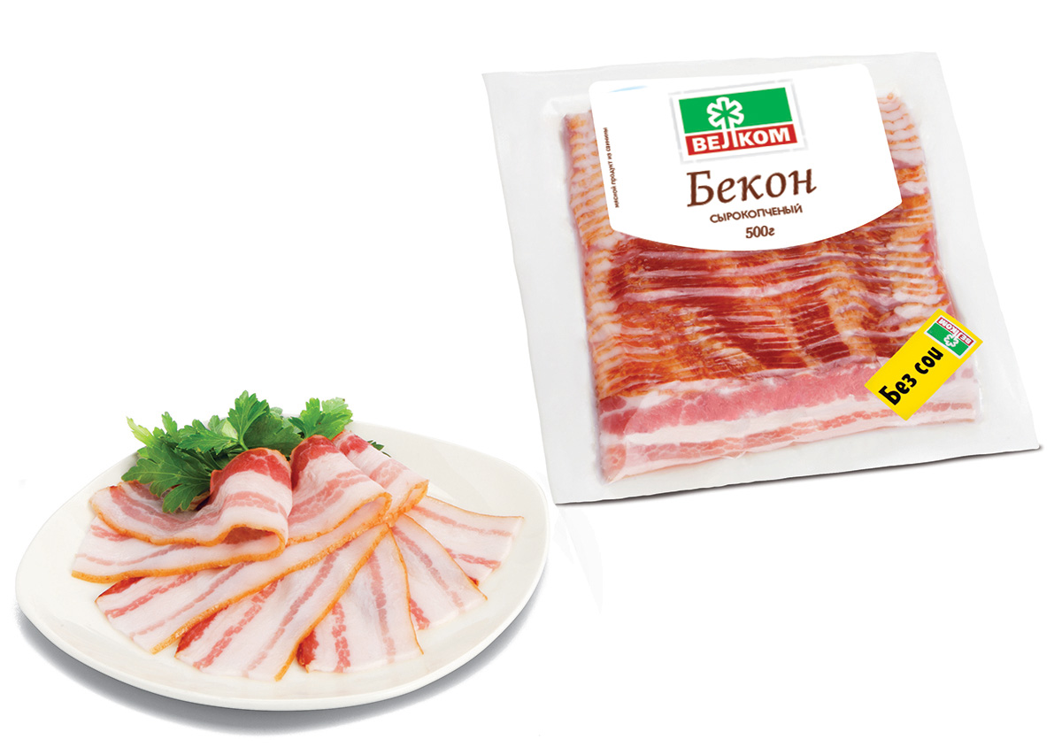 Велком Бекон сырокопченый, 500 г70978 Велком Бекон сырокопченый, 500 г70978Каждый кусочек этого изысканного деликатеса – настоящее наслаждение для истинных гурманов. Изготовлен из охлажденной свинины, подкопченной на натуральных опилках, придающих продукту такой нежный аромат и вкус. Тоненькие ломтики прямо тают во рту, доставляя максимум удовольствия тем, кто ценит натуральные продукты самого высшего качества.