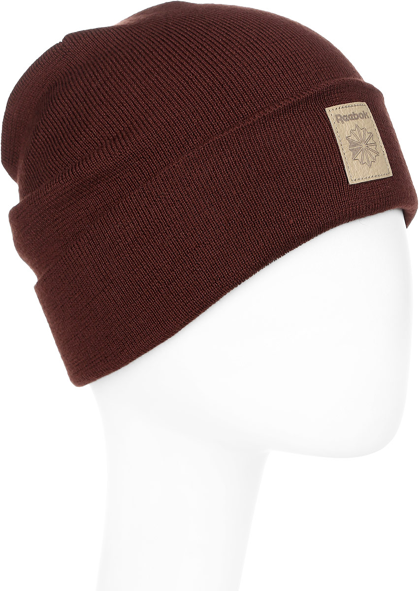 Шапка Reebok Cl Fo Beanie, цвет: бордовый. CD1378. Размер 58/60CD1378 Шапка Reebok Cl Fo Beanie, цвет: бордовый. CD1378. Размер 58/60CD1378Эта шапка от Reebok классического дизайна, своего рода дань уважения богатому спортивному наследию. Классическая модель с отворотом всегда выглядит актуально и надежно защищает от холода. А кожаная нашивка с логотипом придает образу стильную нотку. Свободная посадка. Двухслойный дизайн для дополнительного тепла и стильного образа.Регулируемый отворот.