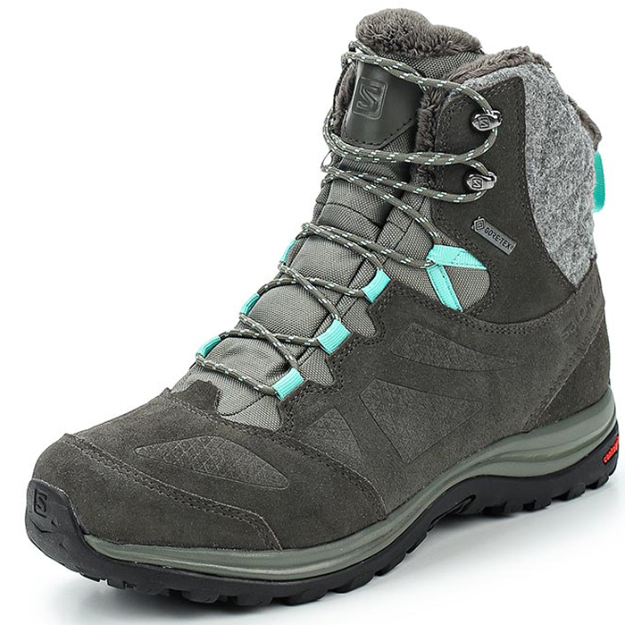 Ботинки трекинговые женские Salomon Ellipse Winter GTX, цвет: серый. L39855000. Размер 5,5 (37)L39855000 Ботинки трекинговые женские Salomon Ellipse Winter GTX, цвет: серый. L39855000. Размер 5,5 (37)L39855000Зимние женские ботинки прекрасно подойдут для походов и повседневной носки.Верх обуви выполнен из водоотталкивающей замши и непромокаемой мембраны. Внутренняя отделка выполнена из мягкого флиса. Шнуровка надежно фиксирует модель на ноге. Обтекаемый силуэт и войлочная отделка создают женственный стиль и отлично смотрятся как на заснеженной тропе, так и на лыжном курорте. Прочная подошва дополнена протектором для лучшего сцепления с любыми поверхностями.