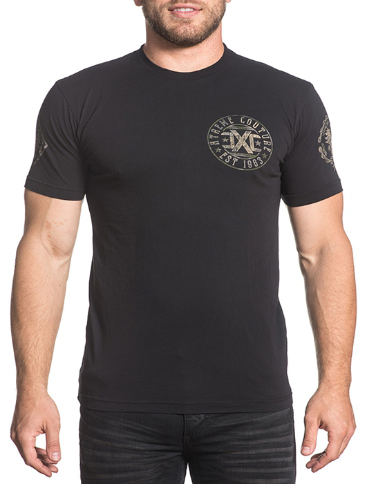 Футболка мужская Affliction Xtreme Couture Soldier Seal, цвет: черный. X1643. Размер 2XL (54)X1643 Футболка мужская Affliction Xtreme Couture Soldier Seal, цвет: черный. X1643. Размер 2XL (54)X1643Футболка мужская Affliction выполнена из натурального хлопка. Модель с круглым вырезом горловины и короткими рукавами оформлена оригинальным принтом.
