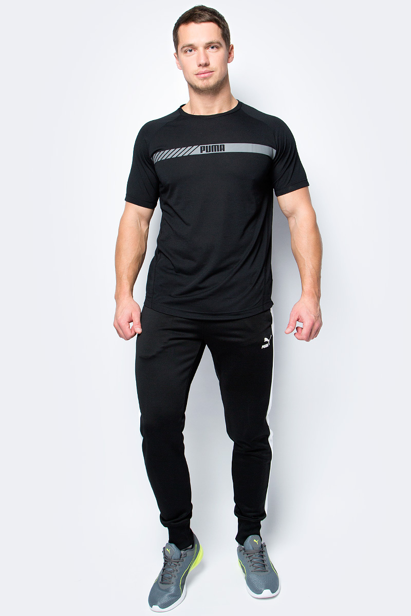 Футболка мужская Puma Active Tec Tee, цвет: черный. 59253001. Размер M (46/48)59253001 Футболка мужская Puma Active Tec Tee, цвет: черный. 59253001. Размер M (46/48)59253001Модель декорирована графическим рисунком, нанесенным методом пигментной печати. Она изготовлена с использованием высокофункциональной технологии DryCell, которая отводит влагу, поддерживает тело сухим и гарантирует комфорт во время активных тренировок и занятий спортом. Фасон рукавов-реглан совершенно не стесняет движений. Боковые швы с нахлестом вперед обеспечивают дополнительное удобство. Изделие имеет комфортную стандартную посадку.