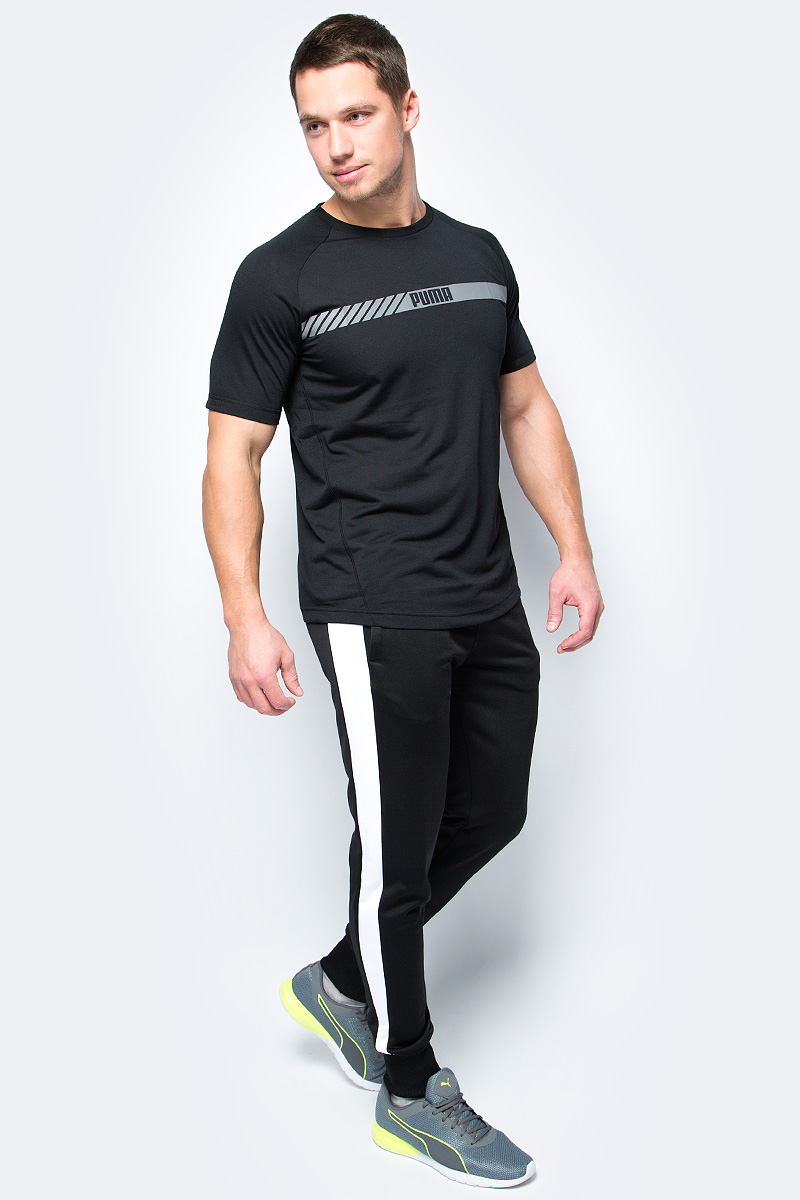Брюки спортивные мужские Puma Archive T7 track, цвет: черный. 57331301. Размер L (48/50)57331301 Брюки спортивные мужские Puma Archive T7 track, цвет: черный. 57331301. Размер L (48/50)57331301Модель декорирована набивным логотипом Puma с прорезиненными деталями, а также ярлыком с логотипом винтажной коллекции Puma на заднем кармане. Пояс из собственного материала изделия с эластичной подкладкой и внутренним затягивающимся шнуром, манжеты по низу штанин и фирменные лампасы формируют оригинальный фасон, обеспечивающий полную свободу движений. Два кармана в боковых швах и прорезной карман на молнии сзади вместительны и удобны. Фасон в обтяжку по фигуре подчеркивает элегантность модели.