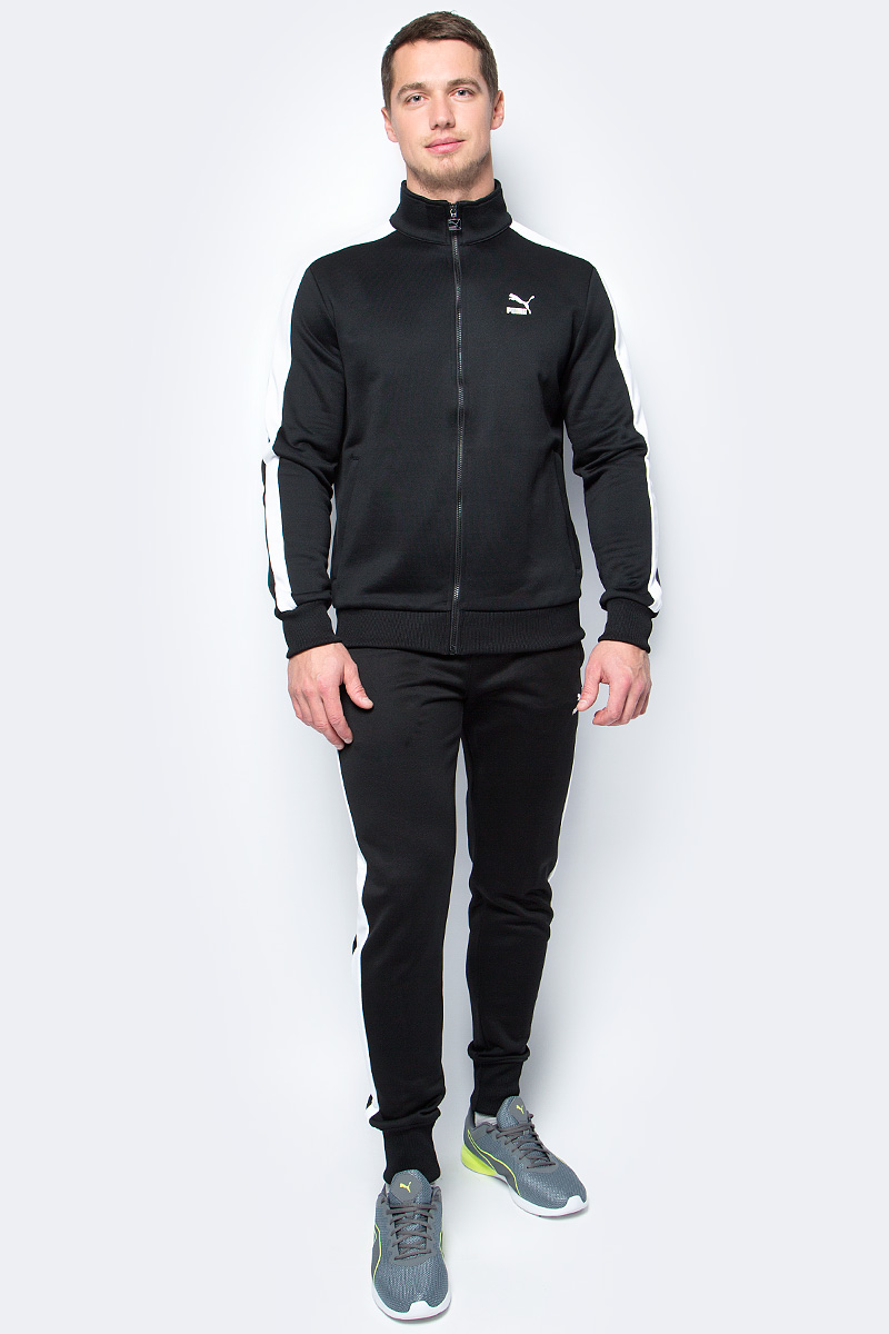 Толстовка мужская Puma Archive T7 track, цвет: черный. 57331201. Размер L (48/50)57331201 Толстовка мужская Puma Archive T7 track, цвет: черный. 57331201. Размер L (48/50)57331201Модель декорирована с лицевой стороны набивным логотипом винтажной коллекции Puma, нанесенным методом пигментной печати, а также набивным рисунком с фирменной символикой на подкладке кармана. Кроме того, сзади на подоле нашит ярлык с логотипом винтажной коллекции Puma. Фирменные вставки в рукава подчеркивают принадлежность модели популярной серии одежды от Puma для спорта и отдыха. Скрытые карманы на молнии спереди удобны и вместительны.Манжеты и подол отделаны эластичным трикотажем в рубчик, что отлично дополняет оригинальный фасон, совершенно не стесняющий движений. Изделие имеет удобную стандартную посадку.