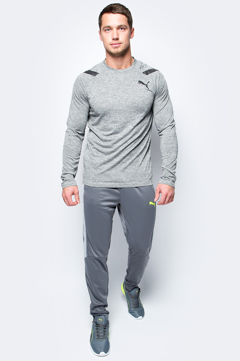 Брюки спортивные мужские Puma evoTRG Pant, цвет: серый. 65534003. Размер L (48/50)65534003 Брюки спортивные мужские Puma evoTRG Pant, цвет: серый. 65534003. Размер L (48/50)65534003Модель декорирована логотипом Puma, нанесенным на левую штанину методом термопечати. Она изготовлена с использованием высокофункциональной технологии DryCell, которая отводит влагу, поддерживает тело сухим и гарантирует комфорт во время активных тренировок и занятий спортом. Фирменные лампасы Puma выполнены из сетчатого материала. Пояс из эластичного материала снабжен затягивающимся шнуром. Такая конструкция пояса удачно дополняет эргономичный фасон в обтяжку по фигуре с зауженными штанинами. Два боковых карманы удобны и достаточно вместительны.