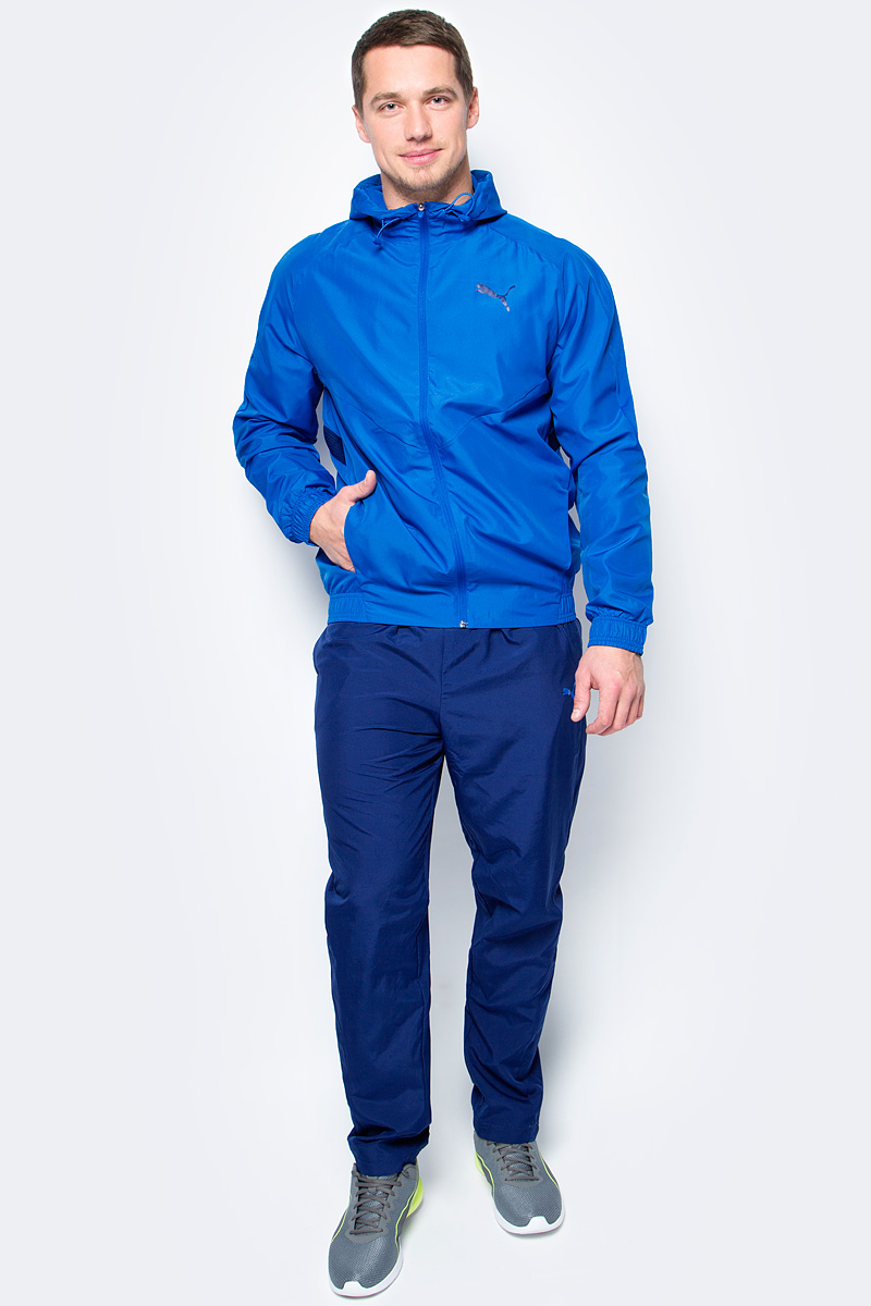 Спортивный костюм мужской Puma Vent Hooded Woven Suit op, цвет: голубой, синий. 59264911. Размер M (46/48)59264911 Спортивный костюм мужской Puma Vent Hooded Woven Suit op, цвет: голубой, синий. 59264911. Размер M (46/48)59264911Спортивный костюм от Puma состоит из толстовки и брюк.Толстовка декорирована логотипом Puma, нанесенным методом пигментной печати. Подкладка полностью выполнена из сетчатого материала. Также имеются вставки из сетчатого материала на лицевой части. Функциональный фирменный покрой рукавов обеспечивает полную свободу движений и легкость сгибания и разгибания руки в локте. Боковые карманы вместительны и удобны. Пояс и манжеты посажены на подкладку из эластичного материала. Детали на спине из эластичной ячеистой тесьмы препятствуют перегреву и делают модель очень эргономичной. Изделие имеет удобную стандартную посадку.Брюки декорированы логотипом Puma, нанесенным методом пигментной печати. Пояс из эластичного материала снабжен затягивающимся шнуром. Вставки из сетчатого материала в области колена способствуют полной свободе движений. Изделие имеет удобную стандартную посадку с зауженными штанинами.