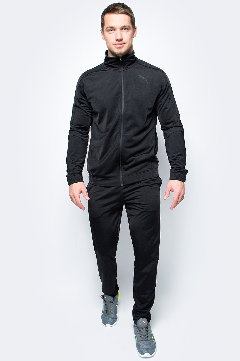 Спортивный костюм мужской Puma Techstripe Tricot Suit op, цвет: черный. 59263601. Размер XL (50/52)59263601 Спортивный костюм мужской Puma Techstripe Tricot Suit op, цвет: черный. 59263601. Размер XL (50/52)59263601Спортивный костюм от Puma состоит из толстовки и брюк.Толстовка декорирована логотипом Puma, нанесенным методом пигментной печати. Функциональный фирменный покрой рукавов обеспечивает полную свободу движений и легкость сгибания и разгибания руки в локте. Боковые карманы вместительны и удобны. Пояс и манжеты посажены на подкладку из эластичного материала. Изделие имеет удобную стандартную посадку.Брюки декорированы логотипом Puma, нанесенным методом пигментной печати. Пояс из эластичного материала снабжен затягивающимся шнуром для лучшей посадки по фигуре. Изделие имеет удобную стандартную посадку, но при этом штанины с манжетами заужены, что в сочетании со вставками контрастного цвета придает модели оригинальный облик.