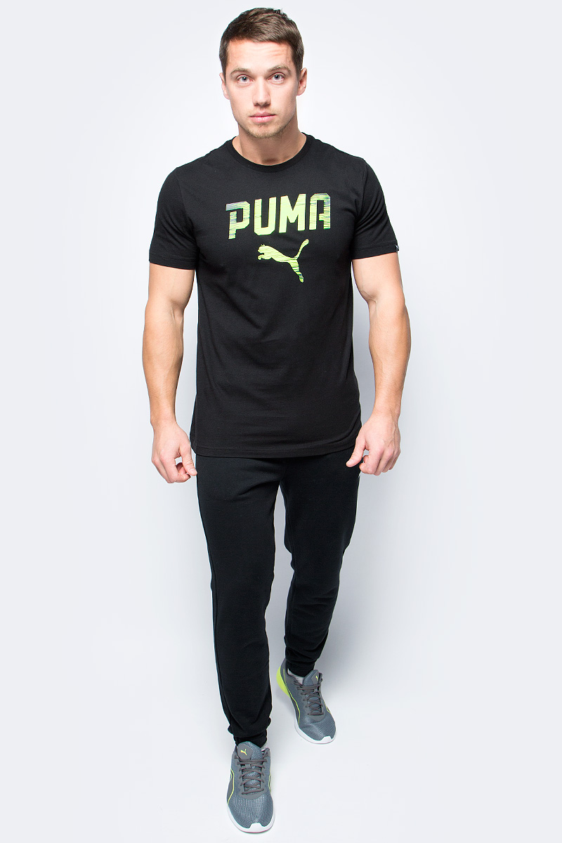 Футболка мужская Puma Rebel Tee, цвет: черный. 590605_01. Размер M (46/48)590605_01 Футболка мужская Puma Rebel Tee, цвет: черный. 590605_01. Размер M (46/48)590605_01Футболка мужская Rebel Tee изготовлена из 100% хлопка с финальной влагоотводящей обработкой на биологической основе. Изделие имеет классический крой, круглый вырез горловины и короткие рукава. Ворот выполнен из трикотажа в рубчик. Футболка декорирована спереди набивным рисунком c прорезиненными деталями. Даже самая прочная и выносливая одежда вряд ли будет более комфортной, чем PUMA Rebel Tee. Модель подойдет для прогулок и занятий спортом, имеет удобный силуэт, который подходит для любого телосложения.