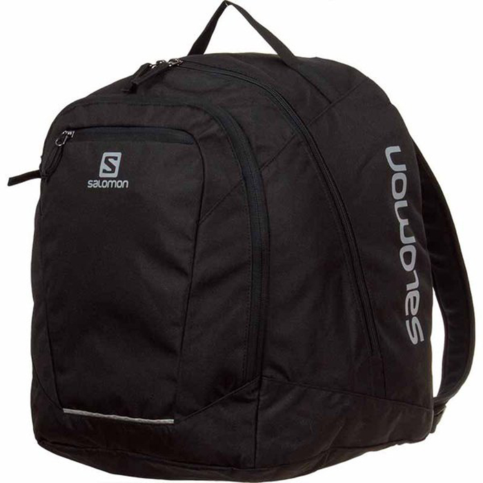 Рюкзак спортивный Salomon Original Gear Backpack, цвет: черный. L39013800L39013800 Рюкзак спортивный Salomon Original Gear Backpack, цвет: черный. L39013800L39013800Рюкзак Salomon Original Gear Backpack выполнен из высококачественного полиакрила. Рюкзак имеет два вместительных отделения, которые закрываются на застежку-молнию. Рюкзак оснащен мягкими удобными лямками, длина которых регулируется с помощью пряжек. Изделие дополнено удобной ручкой для переноски или подвешивания. На внешней стороне расположен втачной карман на застежке-молнии. Полюбившийся спортсменам рюкзак Salomon Original Gear Backpack получил новый обтекаемый силуэт. Сбалансированное распределение нагрузки, простота в использовании, быстрый доступ в основное отделение, удобные набедренные карманы.Идеально подходит для носки всего лыжного снаряжения. Ботинки, защита, шлем и аксессуары поместятся в одном удобном рюкзаке, который не стеснит движение по склонам.