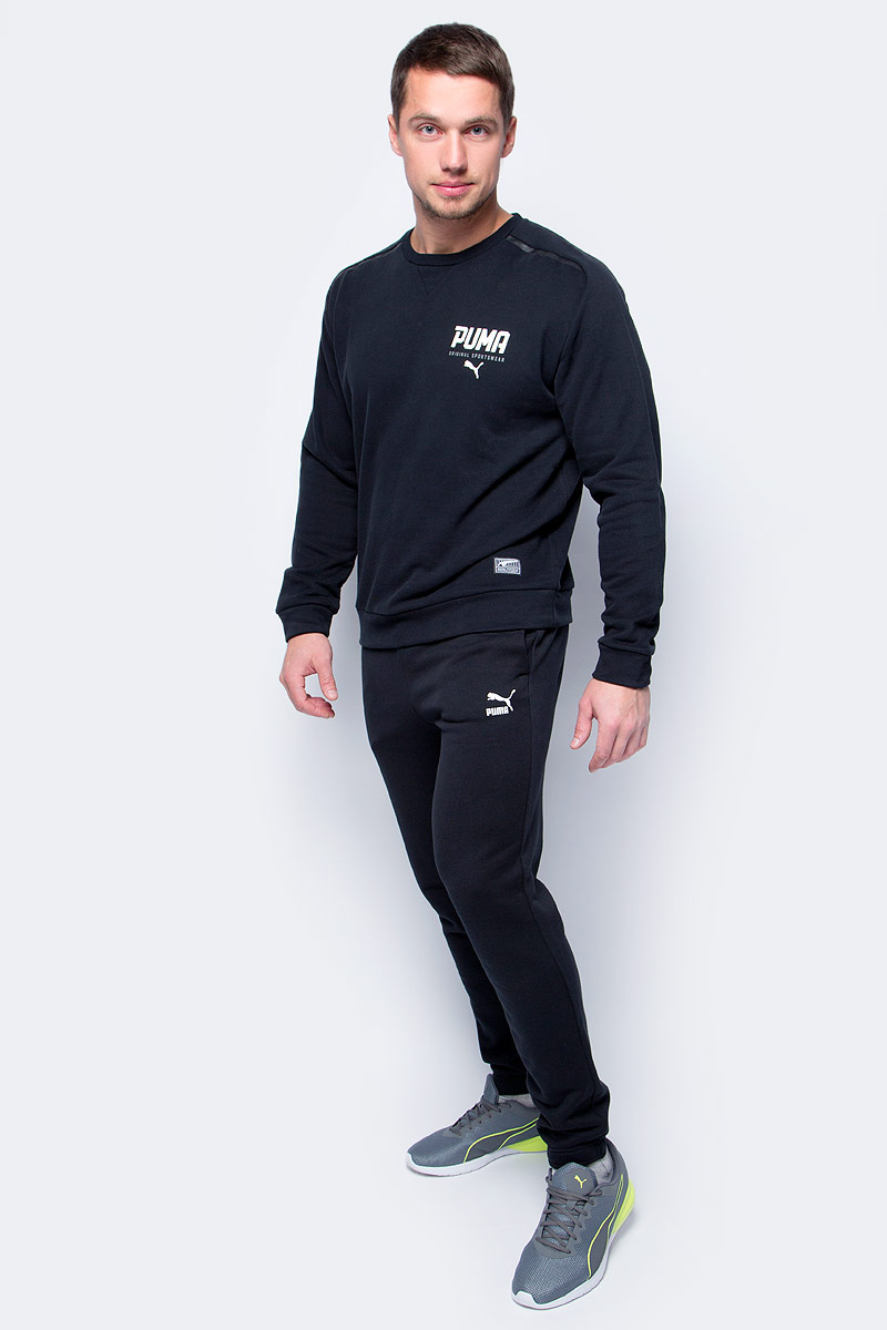 Брюки спортивные мужские Puma Archive Logo Sweat Pants, цвет: черный. 57331501. Размер M (46/48)57331501 Брюки спортивные мужские Puma Archive Logo Sweat Pants, цвет: черный. 57331501. Размер M (46/48)57331501Модель декорирована набивным логотипом винтажной коллекции Puma, выполненного сочетанием пигментной печати и печати напылением, а также тканым ярлыком с фирменной символикой у пояса. Пояс из эластичного материала снабжен затягивающимся шнуром, манжеты также отделаны эластичным материалом. Карман в боковом шве удобен, вместителен и снабжен закрепками. Изделие имеет комфортную стандартную посадку.