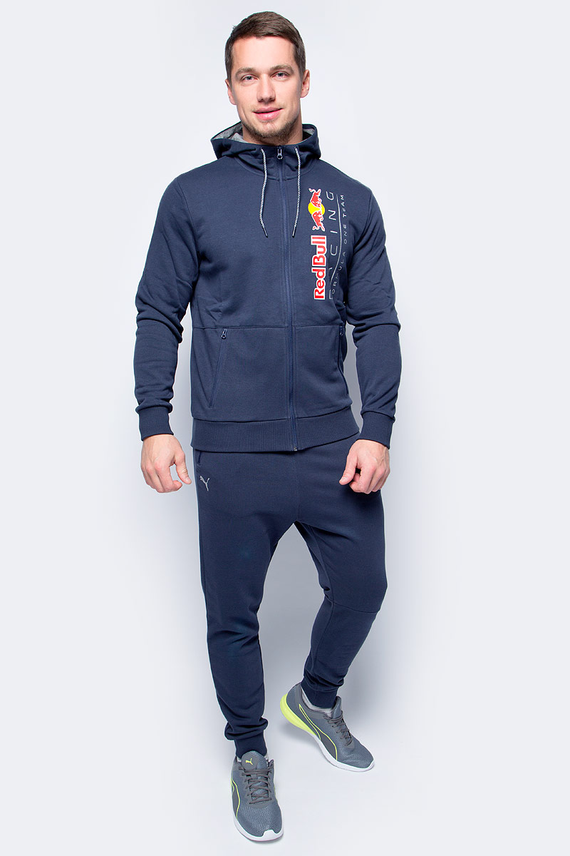 Толстовка мужская Puma RBR Hooded Sweat Jacket, цвет: темно-синий. 57343801. Размер XL (50/52)57343801 Толстовка мужская Puma RBR Hooded Sweat Jacket, цвет: темно-синий. 57343801. Размер XL (50/52)57343801Эта фирменная толстовка с капюшоном RBR Hooded Sweat Jacket предназначена для настоящих энтузиастов автоспорта и фанатов гоночной команды Ред Булл. Она декорирована логотипом RBR на груди, нанесенным методом термопечати, и набивным логотипом Puma. Боковые карманы на молнии обеспечат надежное хранение ваших вещей. Также символика RBR представлена в цветах затягивающихся шнуров, благодаря которым модель можно подогнать по фигуре. Цельнокроеная подкладка капюшона контрастного цвета выполнена из мягкого и уютного трикотажа. Спереди имеется застежка-молния со стопором.