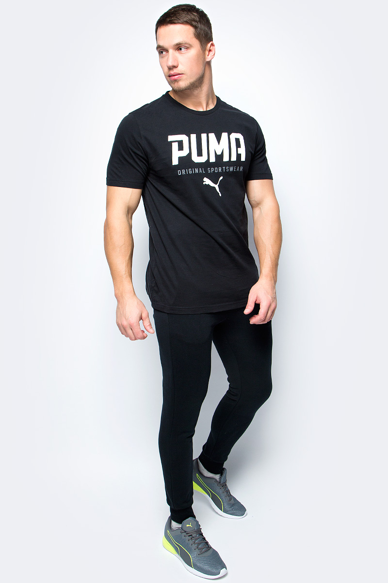 Футболка мужская Puma STYLE Tec Graphic Tee, цвет: черный. 590590_01. Размер XS (44/46)590590_01 Футболка мужская Puma STYLE Tec Graphic Tee, цвет: черный. 590590_01. Размер XS (44/46)590590_01Стильная и удобная футболка STYLE Tec Graphic Tee прекрасно подойдет на каждый день. Модель изготовлена из 100% хлопка с финальной влагоотводящей обработкой на биологической основе. Ворот выполнен из трикотажа в рубчик. Изделие имеет классический крой, круглый вырез горловины и короткие рукава. Футболка декорирована графическим рельефным рисунком из прорезиненного материала и замши.