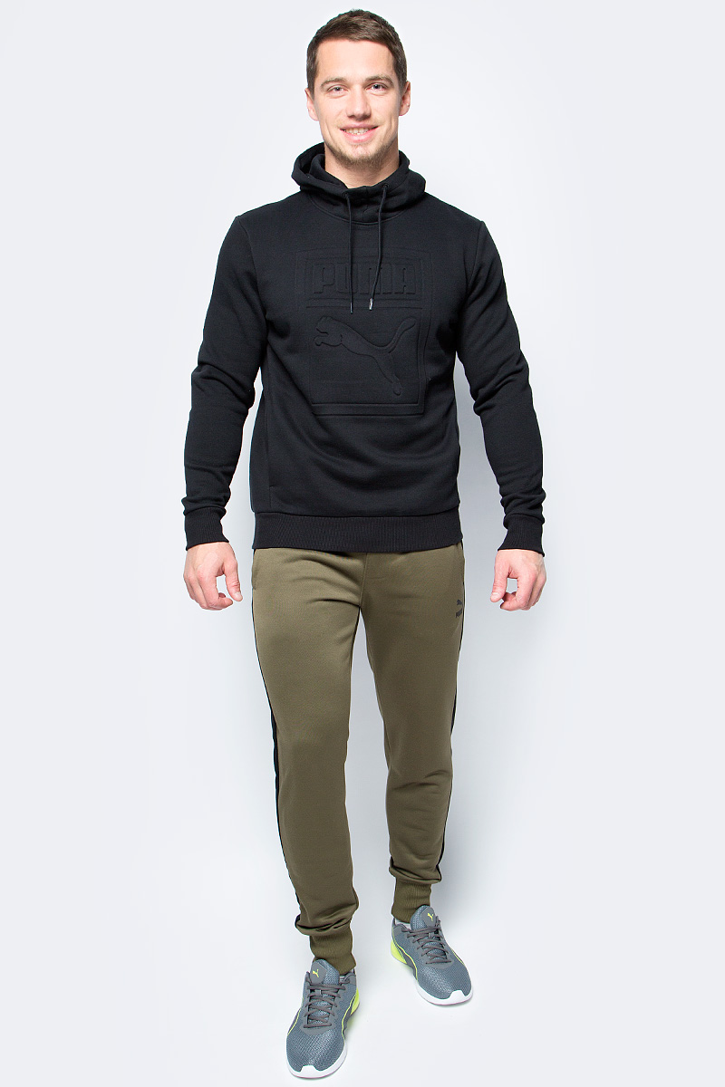 Толстовка мужская Puma Archive Embossed Logo Hoody, цвет: черный. 57330701. Размер M (46/48)57330701 Толстовка мужская Puma Archive Embossed Logo Hoody, цвет: черный. 57330701. Размер M (46/48)57330701Модель декорирована крупным и броским логотипом винтажной коллекции, а также снабжена фирменным тканым ярлыком. Подол и манжеты отделаны трикотажем в рубчик. Фасон в обтяжку по фигуре подчеркивает элегантность модели.