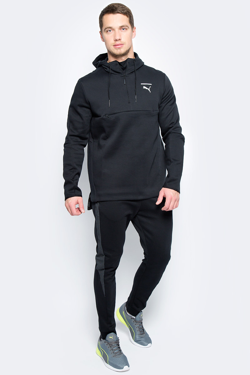 Толстовка мужская Puma Evo Core Savannah, цвет: черный. 57334301. Размер L (48/50)57334301 Толстовка мужская Puma Evo Core Savannah, цвет: черный. 57334301. Размер L (48/50)57334301Модель декорирована графическим набивным рисунком, нанесенным методом печати высокой плотности. Подкладка капюшона выполнена из мягкого и уютного трикотажа. Застежка-молния до половины длины изделия снабжена защитным клапаном. Скрытый карман на молнии спереди удобен и вместителен. Отделка манжет эластичным материалом дополняет оригинальных фасон, обеспечивающий полную свободу движений, как и удлиненный задний подол, надежно закрывающий поясницу. Изделие имеет комфортную стандартную посадку.