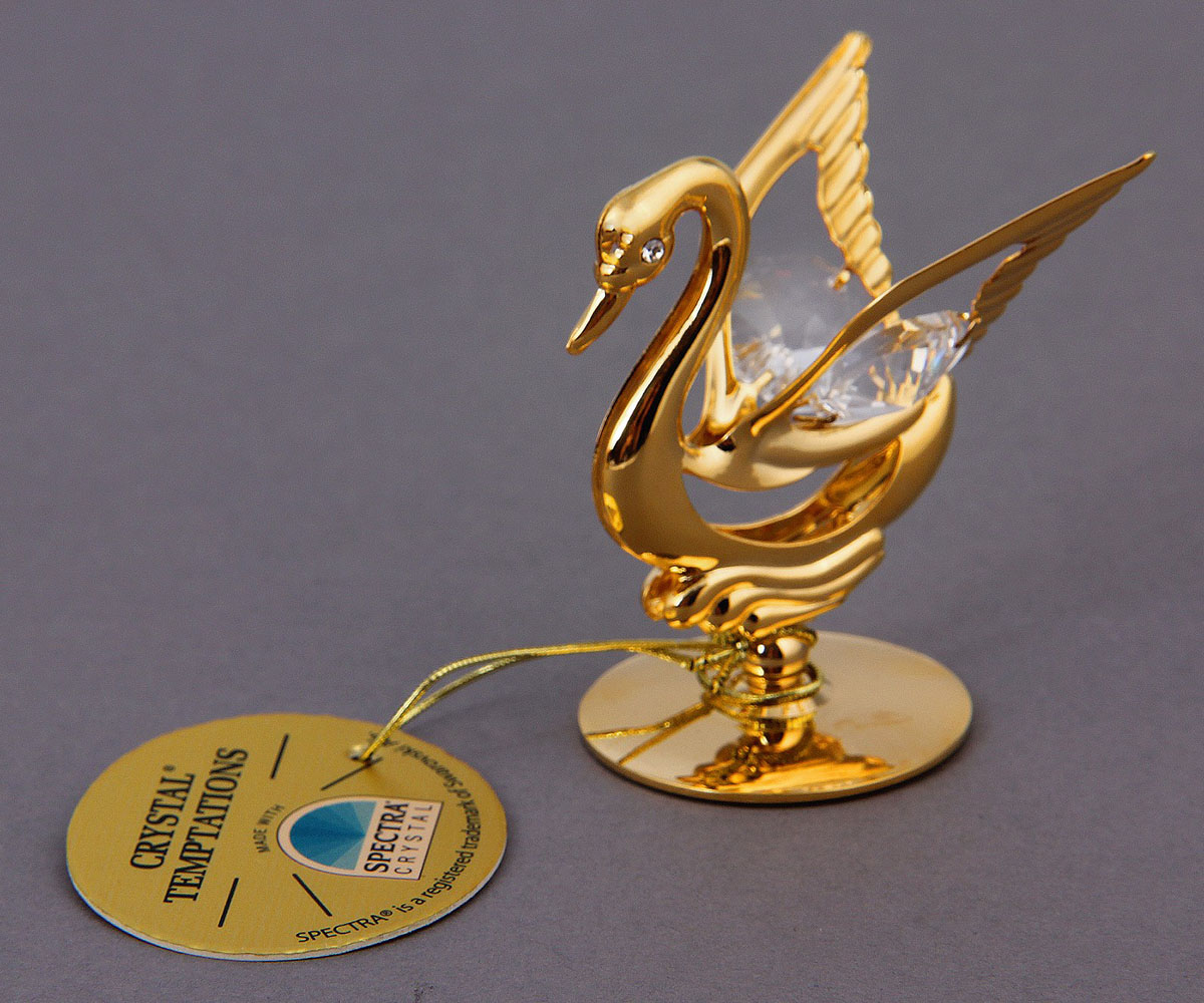 Миниатюра Swarovski Elements Лебедь, с кристаллами Сваровски, 4 х 6 х 3,5 см445456 Миниатюра Swarovski Elements Лебедь, с кристаллами Сваровски, 4 х 6 х 3,5 см445456Сувенирный лебедь станет идеальным подарком близкому человеку и всем любителям эксклюзивных вещей ручной работы. Он символизирует нежность, постоянство и верность в любви.Сувенир украшен стразами Swarovski, которые были признаны специалистами лучшей имитацией бриллиантов. Свет, попадая на кристаллы Swarovski, разбивается на миллион радужных лучей. Это зрелище, бесспорно, оставляет яркое впечатление!