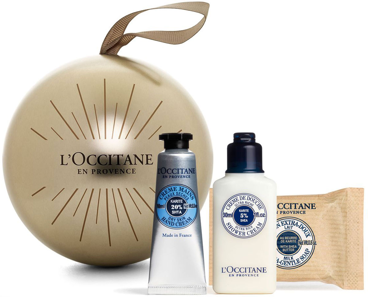 LOccitane Подарочный набор Праздничный Шар. Карите: мыло туалетное экстра-мягкое, 25 г, молочко для тела питательное, 30 мл, крем для рук, 10 мл063942 LOccitane Подарочный набор Праздничный Шар. Карите: мыло туалетное экстра-мягкое, 25 г, молочко для тела питательное, 30 мл, крем для рук, 10 мл063942Мыло великолепно подходит для ежедневного использования. Содержит 100%-ую натуральную основу, обогащен маслом карите.Подходит для мужчин, женщин и детей.Нежный бальзам с тонким ароматом на основе масла карите восстанавливает и питает пересушенную кожу губ. Смягчает, питает, увлажняет кожу ног. Оказывает освежающее успокаивающее воздействие, снимает раздражение и усталость ног. Предотвращает образование мозолей и натоптышей, способствует заживлению трещин. Крем для рук отлично смягчает кожу рук, благодаря 20%-ному содержанию масла карите, меду и экстракту сладкого миндаля. Экстракты жасмина и иланг-иланга придают коже изысканный легкий аромат. Крем Карите для рук отлично впитывается, заживляет и защищает сухую/обезвоженную кожу. Антиоксидант витамин Е способствует питанию кожи рук. Лосьон для рук и тела содержит 5% масла Карите, экстракт меда и овсяное молочко для смягчения и гладкости кожи. Предотвращает раздражение. Держите его под рукой в ванной или на кухне, чтобы избежать иссушающего эффекта частых контактов с водой. Удачное сочетание геля и увлажняющего крема в одном средстве. Мягко очищает кожу и при необходимости волосы. Молочко Карите смягчает и успокаивает, нейтрализует негативное влияние жесткой воды; Пшеничные протеины восстанавливают на коже и волосах защитный слой; Копра, пальмовое масло 100% растительная мыльная основа - хорошо очищает кожу, не повреждая ее; Сорбитол сохраняет влагу в коже; Кожа становится мягкой, шелковистой, процесс очищения становится более комфортным и приятным. После очищения нет ощущения сухости.