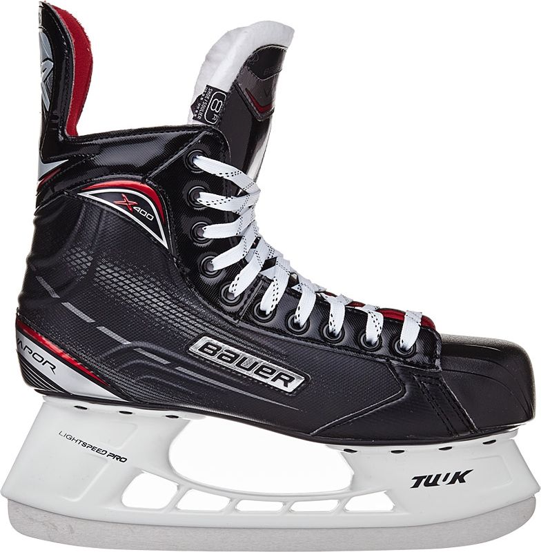 Коньки хоккейные мужские BAUER Vapor X400, цвет: черный. 1050594. Размер 421050594 Коньки хоккейные мужские BAUER Vapor X400, цвет: черный. 1050594. Размер 421050594Хоккейные коньки BAUER VAPOR X400 SR взрослая модель, разработанная специально для начинающих хоккеистов. Материал Tech Nylon, используемый в качестве материала для корпуса ботинок, обладает высокой прочностью и устойчивостью к механическим повреждениям. Ботинок имеет характерный для линейки Vapor дизайн X-Rib с ребрами жесткости в задней части, что придает ботинку пространственную жесткость, ботинок меньше деформируется при нагрузке и способствует быстрой передачи усилия от ноги на лед. Термоформируемый верх обладает удобной посадкой. Дополнительное заполнение в области лодыжки, выполненное из модернизированной пены Anaform Foams, обеспечивает плотную фиксацию пятки и голеностопного сустава, не позволяет ноге проскальзывать в ботинке и придает дополнительную устойчивость. Внутренняя подкладка из микрофибры обеспечивает комфорт и способствует быстрому высыханию ботинок. Внутренний язычок имеет анатомическую, двухсоставную конструкцию, в качестве внутреннего наполнения в язычке используется пена средней плотности и подкладка из белого войлока. Внутренняя формованная стелька Comfort способствует удобному положению стопы внутри ботинка. Термопластичная резина, используемая при изготовлении подошвы ботинок, отличается долговечностью, высокой морозоустойчивостью, легкостью. К ботинкам приклепаны стаканы Tuuk Lightspeed Pro с несменными лезвиями Tuuk Super-Stainless.