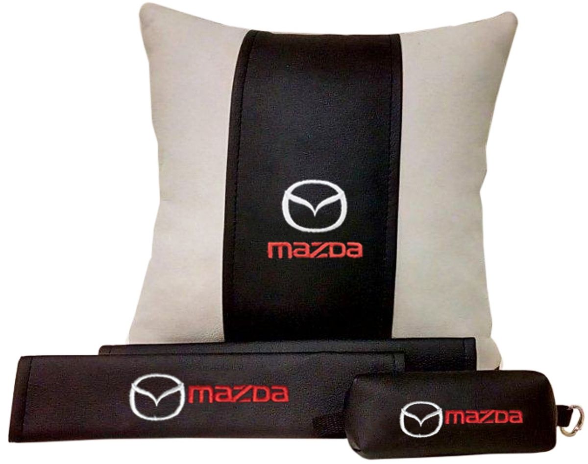 Подарочный набор автомобилисту Auto Premium Mazda, 3 предмета67604 Подарочный набор автомобилисту Auto Premium Mazda, 3 предмета67604В набор входит: -подушка в салон автомобиля -накладки на ремень безопасности -ключница. На все изделия нанесена индивидуальная вышивка. При производстве используется качественная и износостойкая экокожа, что позволяет надолго сохранить презентабельный внешний вид любого изделия. Такой подарок не оставит равнодушным ни одного автолюбителя.