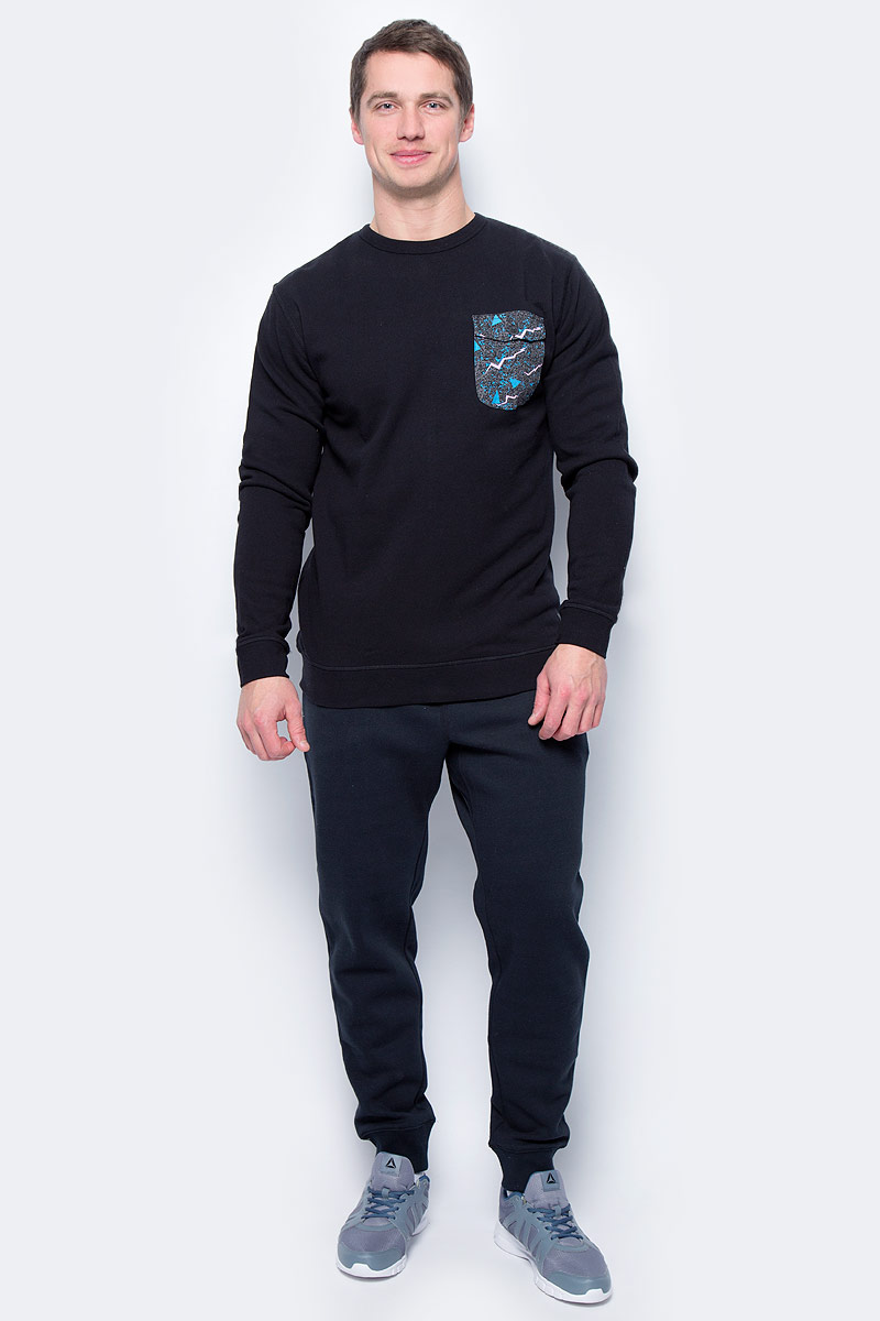 Толстовка мужская DC Shoes, цвет: черный. EDYFT03269-KVJ0. Размер XL (52/54)EDYFT03269-KVJ0 Толстовка мужская DC Shoes, цвет: черный. EDYFT03269-KVJ0. Размер XL (52/54)EDYFT03269-KVJ0Мужская толстовка DC Shoes выполнена из толстой и приятной на ощупь махровой ткани. Модель имеет комфортный классический крой, длинные рукава и круглый вырез горловины. Горловина дополнена эластичным материалом в рубчик. На груди расположен карман, закрывающийся клапаном на пуговицу. Карман и верхняя часть изделия с задней стороны выполнены из саржевой ткани и дополнены ярким принтом.