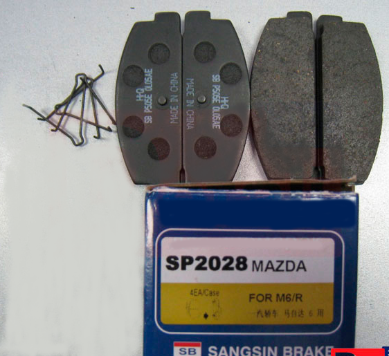 Тормозные колодки дисковые Sangsin SP2028SP2028 Тормозные колодки дисковые Sangsin SP2028SP2028Колодки тормозные задние дисковые MAZDA 323, 626, Sangsin. SP2028