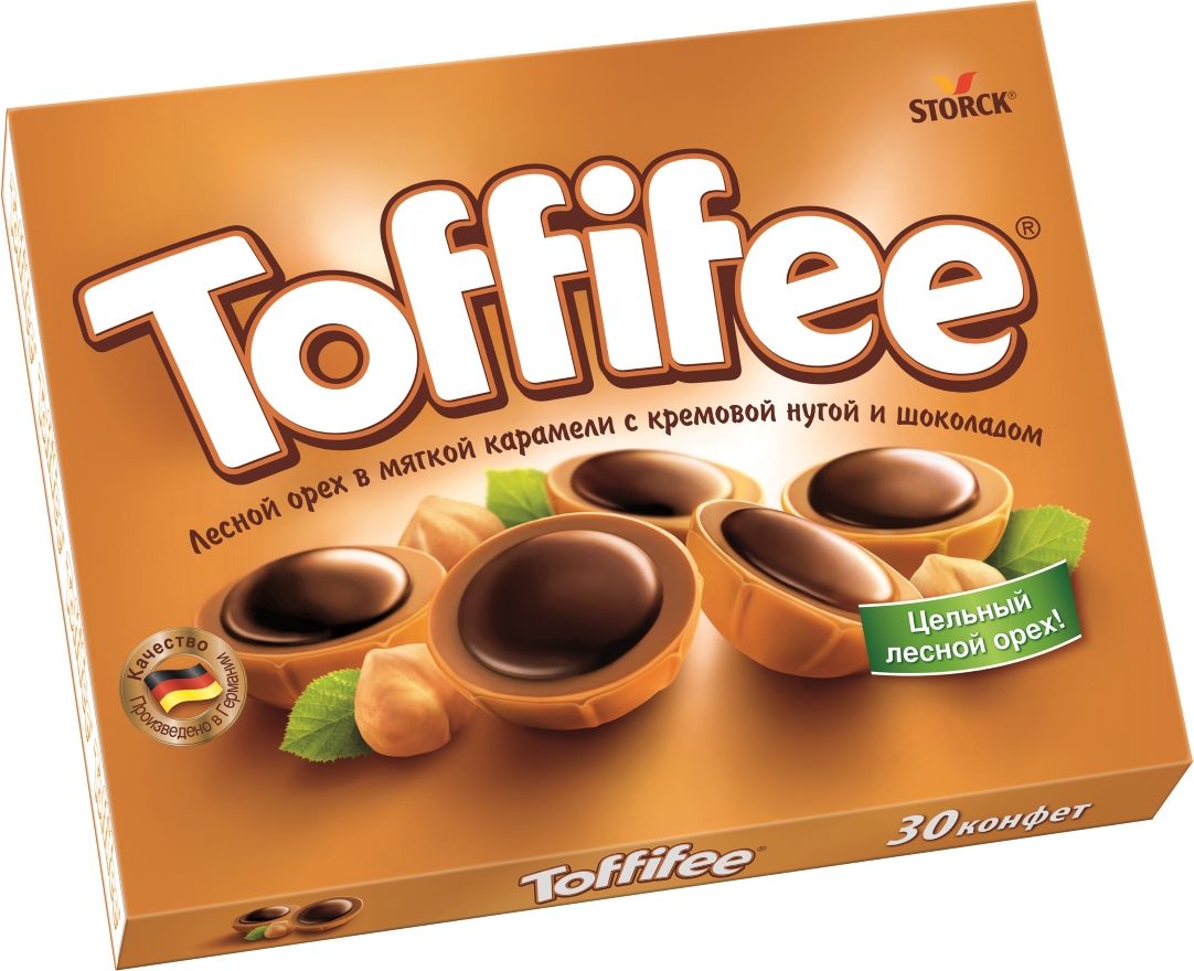 Toffifee конфеты орешки в карамели, 250 г018745-43/46 Toffifee конфеты орешки в карамели, 250 г018745-43/46В 1973 году в Германии появляются первые конфеты Toffifee, которые стали и остаются уникальными во всем мире благодаря сочетанию вкуснейших компонентов. Сегодня конфеты Toffifee популярны в более чем 100 странах мира, ведь Toffifee объединили в себе все самое вкусное: отборный цельный лесной орех в чашечке из мягкой карамели, наполненной нежной кремовой нугой и покрытой восхитительным шоколадом.