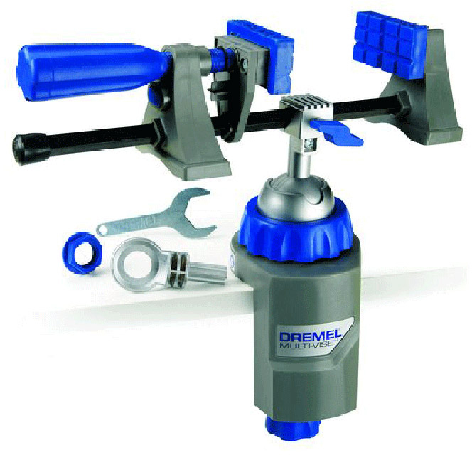Тиски Dremel Multi-Vise 250026152500JA Тиски Dremel Multi-Vise 250026152500JAМногофункциональные тиски Dremel Multi-Vise 2500 - это инструмент 3 в 1: стационарные тиски, отдельный крепежный элемент и зажим для инструмента. Тиски крепятся на любой верстак, рабочую платформу или поверхность толщиной до 6,3 мм. Преимущества:- крепится на любой рабочий стол, платформу или облицовочный материал; - поворачивается на 360° и наклоняется на 50°. Позволяет работать с заготовкой под удобным углом; - губки можно использовать вместе с базовым блоком или отдельно как струбцину; - удобное расположение больших заготовок; - фиксирует большие предметы и защищает хрупкие детали от повреждения; - позволяет работать с круглыми деталями и заготовками неправильной формы; - позволяет быстро удалять предметы из зажима; - обеспечивает большую стабильность; - возможность присоединить фонарь DremeLite. Материал рамы: пластик.Тип тисков: поворотные.Ширина: 190 мм.