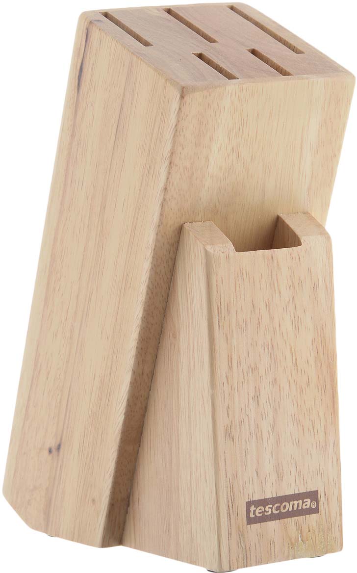 Подставка Tescoma "Woody", выполненная из первоклассной древесины бразильского каучука, предназначена для 5 ножей и ножниц и займет достойное место на вашей кухне, добавив интерьеру оригинальности и изысканности. Она поможет вам в удобном и безопасном хранении ножей. Подставка очень устойчива и не упадет, когда вы будете вынимать из нее ножи. Дно изделия оснащено силиконовыми накладками для предотвращения скольжения по поверхности стола. Благодаря такой подставке кухонные ножи всегда будут у вас под рукой.Размер: 21 см х 15 см х 7,5 см.