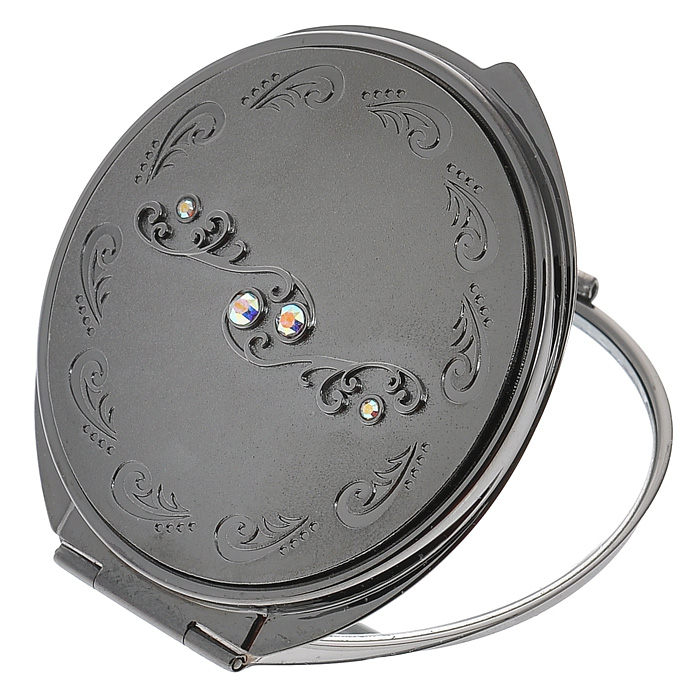 Зеркало двухстороннее Jardin DEte. 98-0971002742 Зеркало двухстороннее Jardin DEte. 98-0971002742Компактное двухстороннее зеркало Jardin DEte станет незаменимым аксессуаром в сумочке любой модницы. В круглом стальном корпусе с покрытием из хрома внутри находятся два зеркальца: обычное и увеличивающее. Корпус оформлен фигурной гравировкой и украшен маленькими разноцветными стразами. Такое зеркальце станет отличным подарком представительнице прекрасного пола и подчеркнет ее неповторимый стиль. Зеркало упаковано в подарочную коробку розового цвета. В комплекте - текстильный мешочек на завязках для хранения. Характеристики:Материал: сталь, хром, стекло. Диаметр зеркала: 5,5 см. Размер упаковки: 11 см х 12,5 см х 3 см. Изготовитель: Китай.Артикул: 98-0971.