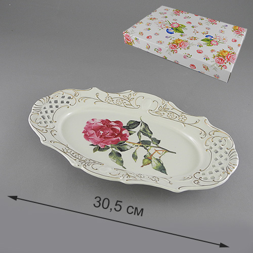 Блюдо Besko Розита. 528-344115510 Блюдо Besko Розита. 528-344115510Блюдо Besko Розита, изготовленное из фарфора, оформлено изображением розыи золотистым орнаментом. Такое блюдо сочетает в себе изысканный дизайн с максимальной функциональностью. Красочность оформления придется по вкусу тем, кто предпочитает утонченность и изящность. Оригинальное блюдо украсит сервировку вашего стола и подчеркнет прекрасный вкус хозяйки, а также станет отличным подарком. Характеристики:Материал: фарфор. Размер блюда: 30 см х 17 см х 3,5 см. Глубина блюда: 1 см. Артикул: 528-344.