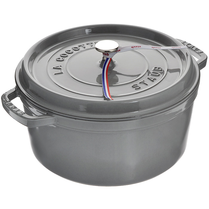 Кокот чугунный Zwilling Staub с крышкой, круглый, цвет: серый графит, 5,85 л. 1102818TLY081-CK-AL Кокот чугунный Zwilling Staub с крышкой, круглый, цвет: серый графит, 5,85 л. 1102818TLY081-CK-ALКруглый кокот Zwilling Staub выполнен из чугуна с внешним эмалевым покрытием цвета серого графита. Внутренняя поверхность покрыта двумя слоями матовой эмали специального состава.Чугун - это один из материалов, который лучше всего сохраняют тепло, медленно его проводит и равномерно распределяет. Блюдо в таком кокоте не потребует повторного разогрева в течение достаточно длительного промежутка времени. Кокот так же хорошо сохраняет и холод, для этого достаточно поставить блюдо в холодильник перед его подачей на стол. Эмаль позволяет обеспечить лучшее сопротивление перепадам температуры и образованию царапин, а также облегчает уход за посудой. Эмалевое покрытие обладает идеальными качествами для запекания, жарки и карамелизования пищевых продуктов. Такой кокот идеально подходит для приготовления блюд, которые требуют длительного тушения. Например, плов, овощное рагу или всевозможные каши не доводят до готовности на огне, а оставляют томиться, как в печке. При этом пища сохраняет свои полезные и питательные свойства и не наполняется вредными канцерогенами. Изделие оснащено удобной плоской крышкой с шипами Picots. Это эксклюзивное инновационное решение позволяет каплям конденсата равномерно орошать готовящееся блюдо. Мясо остается таким же нежным, а овощи - мягкими. Никелированная ручка позволяет использовать кокот в духовом шкафу до 250°С. Благодаря дизайну крышки чугунный кокот теряет намного меньше влаги во время приготовления пищи. По истечении 55 минут процесса приготовления пищи в кокоте сохраняется на 10% больше влаги по сравнению с другими чугунными кокотами.Подходит для использования на всех типах плит (газовые, электрические, галогенные, стеклокерамические, индукционные). Можно использовать в духовом шкафу и мыть в посудомоечной машине. Перед первым использованием вымыть горячей водой, высушить на слабом огне, затем смазать растительным маслом изнутри. Погреть несколько минут на слабом огне и вытереть избыток масла. Мыть жидким моющим средством, без применения абразивных веществ и металлических губок. При падении на твердую поверхность посуда может треснуть или разбиться. Металлические кухонные принадлежности могут повредить посуду. Чтобы не обжечься, пользуйтесь прихватками. В комплекте - брошюра с советами по использованию и рецептами. Характеристики:Материал: чугун, никель. Цвет: серый графит. Объем: 5,85 л. Диаметр кокота: 28 см. Высота стенки: 13 см. Толщина стенки: 0,3 см. Толщина дна: 0,7 см. Диаметр дна: 24 см. Размер упаковки: 32 см х 31 см х 15 см. Артикул: 1102818.