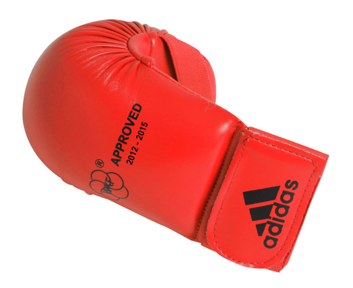 Накладки для карате Adidas WKF Bigger, цвет: красный. 661.22. Размер XL661.22 Накладки для карате Adidas WKF Bigger, цвет: красный. 661.22. Размер XL661.22Изогнутые накладки Adidas WKF Bigger с объемным наполнителем необходимы при занятиях спортом для защиты пальцев, суставов и кисти руки в целом от вывихов, ушибов и прочих повреждений. Накладки выполнены из высококачественного полиуретан PU3G. Накладки прочно фиксируются на запястье за счет широкой эластичной ленты на липучке. Удобные и эргономичные накладки Adidas идеально подойдут для занятий карате и другими видами единоборств.Одобрены WKF. Рассчитаны на рост 180-190 см.