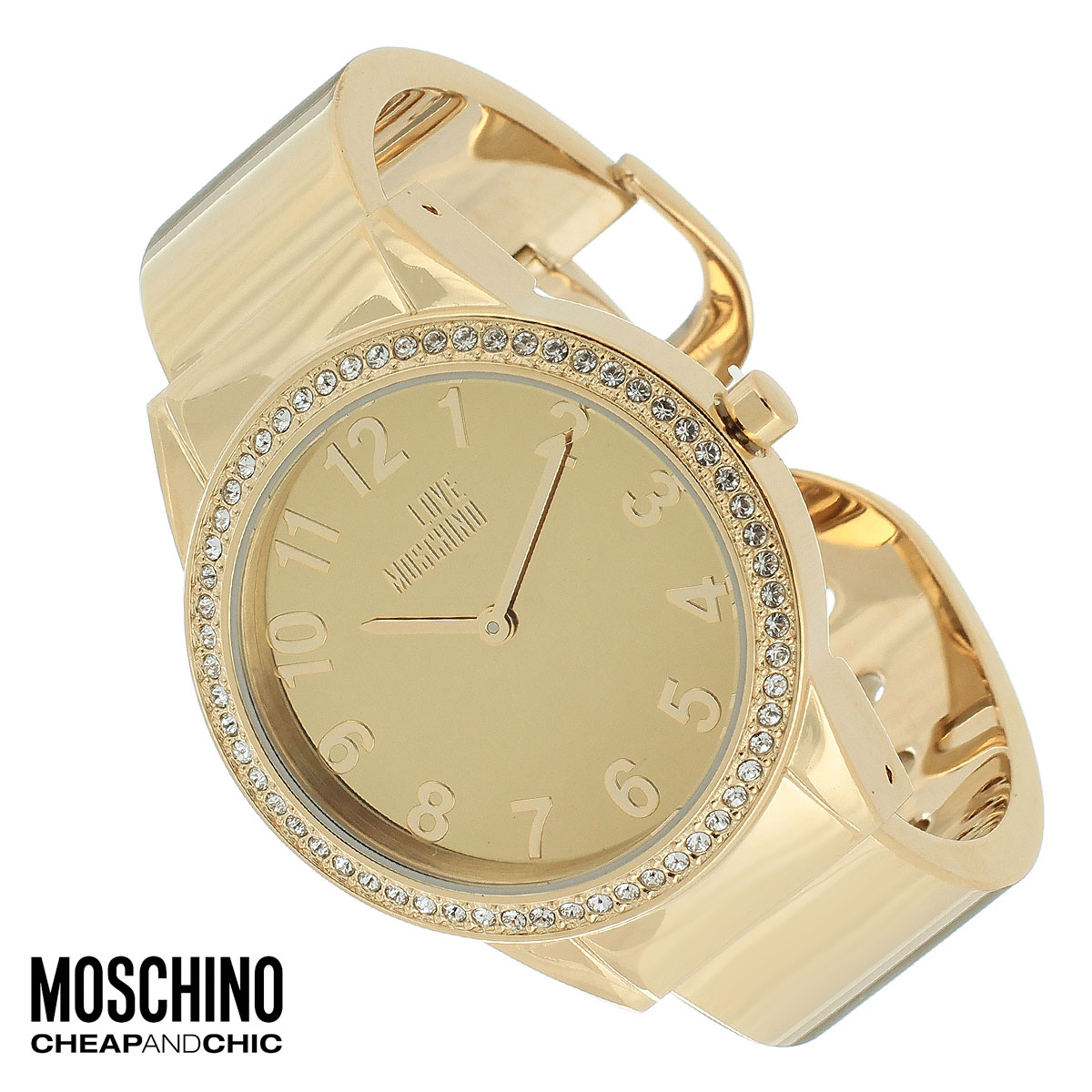 Часы женские наручные Moschino, цвет: золотой. MW0441BM8434-58AE Часы женские наручные Moschino, цвет: золотой. MW0441BM8434-58AEНаручные часы от известного итальянского бренда Moschino - это не только стильный и функциональный аксессуар, но и современные технологи, сочетающиеся с экстравагантным дизайном и индивидуальностью. Часы Moschino оснащены кварцевым механизмом. Корпус выполнен из высококачественной нержавеющей стали с PVD-покрытием и по контуру циферблата оформлен стразами. Циферблат оформлен арабскими цифрами, надписью Love Moschino и защищен минеральным стеклом. Часы имеют две стрелки - часовую и минутную. Браслет часов выполнен из нержавеющей стали и имеет разъемную конструкцию.Часы упакованы в фирменную металлическую коробку с логотипом бренда. Часы Moschino благодаря своему уникальному дизайну отличаются от часов других марок своеобразными циферблатами, функциональностью, а также набором уникальных технических свойств.Каждой модели присуща легкая экстравагантность, самобытность и, безусловно, великолепный вкус. Характеристики: Диаметр циферблата: 3 см.Размер корпуса: 3,7 см х 4,4 см х 0,9 см.Длина браслета (с корпусом): 13,5 см.Ширина браслета: 1,6 см.