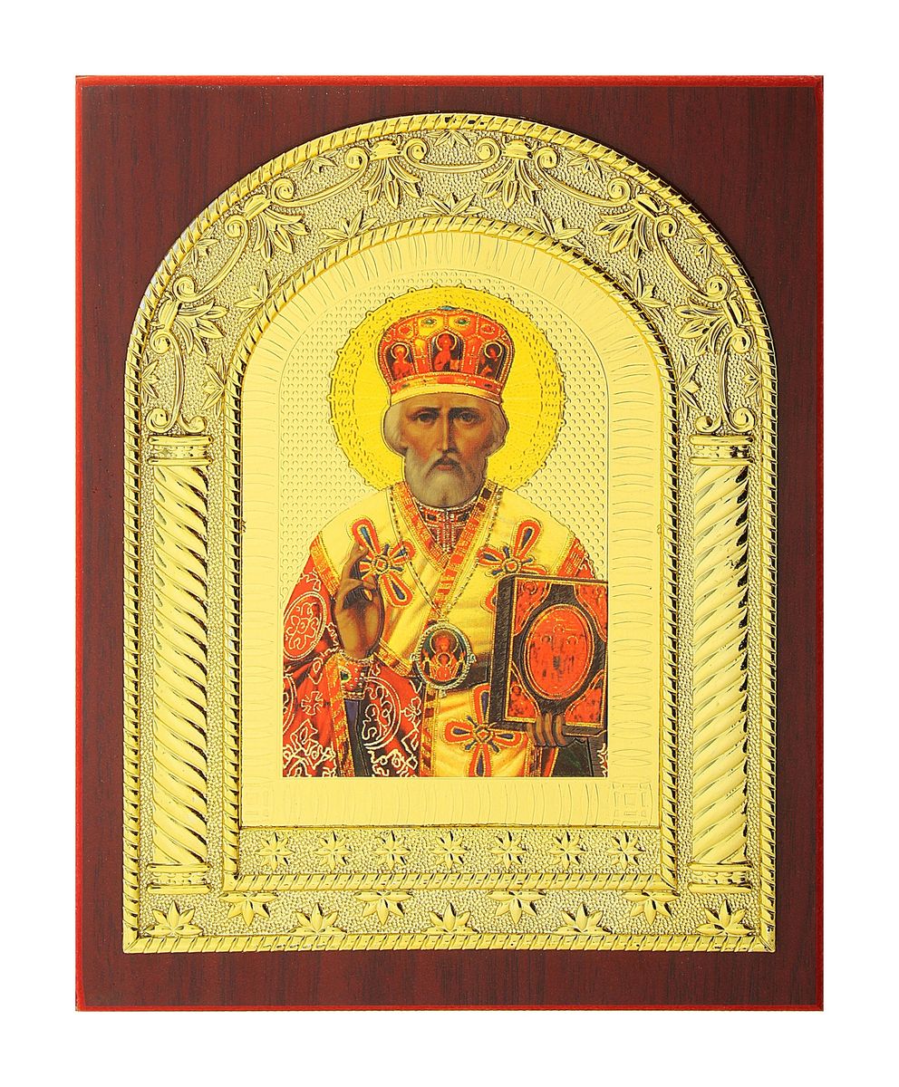 Икона Николай Чудотворец, 19 х 23,5 см94672 Икона Николай Чудотворец, 19 х 23,5 см94672Икона Николай Чудотворец состоит из деревянной рамы, в которую вставлена пластиковая основа с изображением православной иконы. С задней стороны имеется ножка для удобного размещения на плоской горизонтальной поверхности. Изображенный образ полностью соответствует канонам Русской Православной Церкви.Такая икона привнесет в ваш дом согласие и мир и будет прекрасным подарком, оберегающим близких вам людей.
