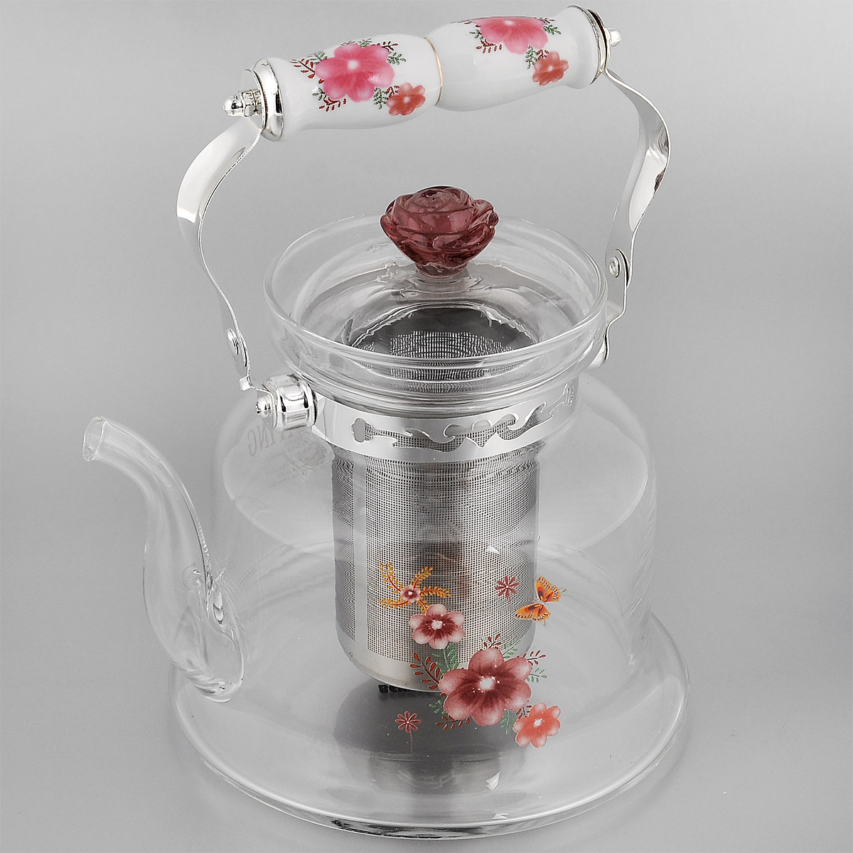 Чайник заварочный Bekker Koch, цвет: красный, 1,4 л. ВК-7620VT-1520(SR) Чайник заварочный Bekker Koch, цвет: красный, 1,4 л. ВК-7620VT-1520(SR)Заварочный чайник Bekker Koch выполнен из жаростойкого стекла, которое хорошо удерживает тепло. Ручка и съемное ситечко внутри чайника выполнены из высококачественной нержавеющей стали. Высокая ручка чайника, снабженная фарфоровой насадкой, позволяет с легкостью удерживать его на весу. Съемное ситечко для заварки предотвращает попадание чаинок и листочков в настой. Заварочный чайник украшен изящным рисунком, что придает ему элегантность. Заварочный чайник из стекла удобно использовать для повседневного заваривания чая практически любого сорта. Но цветочные, фруктовые, красные и желтые сорта чая лучше других раскрывают свой вкус и аромат при заваривании именно в стеклянных чайниках и сохраняют полезные ферменты и витамины, содержащиеся в чайных листах.Высота чайника (без учета ручки и крышки): 17,5 см.Размер съемного ситечка: 9 см х 9 смх 11 см.Диаметр чайника (по верхнему краю): 9,5 см.