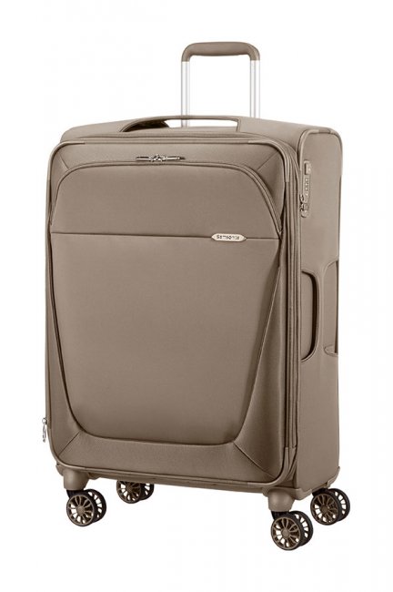 Чемодан Samsonite B-Lite 3, цвет: орех, 81,5/88 л39D*03006 Чемодан Samsonite B-Lite 3, цвет: орех, 81,5/88 л39D*03006Чемодан Samsonite B-Lite 3 прекрасно подойдет для путешествий. Материал внешней отделки - плотный текстиль (нейлон 400D и полиэстер 450D), внутренняя отделка - полиэстеровая ткань. Чемодан очень вместителен, он содержит продуманную внутреннюю и внешнюю организацию, которая позволяет удобно разложить вещи и избежать их сминания. Имеется одно большое отделение с возможностью увеличения объема, которое закрывается по периметру на застежку-молнию с двумя бегунками. Внутри содержится большой отдел для одежды с перекрещивающимися багажными ремнями, соединяющимися при помощи пластикового карабина, и два сетчатых кармана на молнии (карман на крышке снабжен ремнями). Снаружи имеется большой карман на молнии. Для удобной перевозки чемодан оснащен четырьмя маневренными колесами, которые обеспечивают легкость перемещения в любом направлении. Телескопическая ручка выдвигается нажатием на кнопку и фиксируется в одном положении. Сбоку, сверху и снизу предусмотрены ручки для поднятия чемодана. Чемодан оснащен пластиковой биркой для карточки с личными данными и кодовым замком TSA, который исключает возможность взлома. Отверстие в кодовом замке предназначено для работников таможни (открытие багажа для досмотра без присутствия хозяина). Ключ находится только у таможни. Чемодан Samsonite B-Lite 3 идеально подходит для поездок и путешествий. Он вместит все необходимые вещи и станет незаменимым аксессуаром во время поездок. Размер чемодана (ДхШхВ): 46 см x 29/32 см х 71 см. Высота чемодана (с учетом колес и выдвинутой ручки): 105 см. Высота выдвижной ручки: 40 см. Диаметр колеса: 6 см.