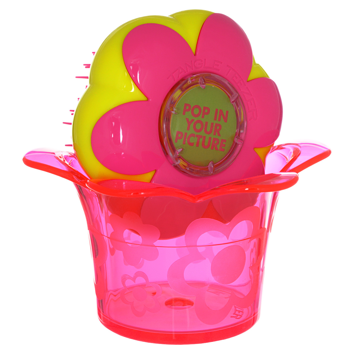 Tangle Teezer Расческа для волос Magic Flowerpot. Princess PinkSatin Hair 7 BR730MN Tangle Teezer Расческа для волос Magic Flowerpot. Princess PinkSatin Hair 7 BR730MNДетская распутывающая чудо-расческа Tangle Teezer Magic Flowerpot Princess Pink идеально подходит для всех типов волос. Оригинальная форма зубчиков обеспечивает двойное действие и позволяет быстро и безболезненно расчесать влажные и сухие волосы, не нарушая структуру детских волос. Подходит детям от 3-х лет. Благодаря эргономичному дизайну, расческу удобно держать в руках, не опасаясь выскальзывания. Расческа дополнена оригинальной подставкой, в которой можно хранить различные резиночки и заколочки. Товар сертифицирован.