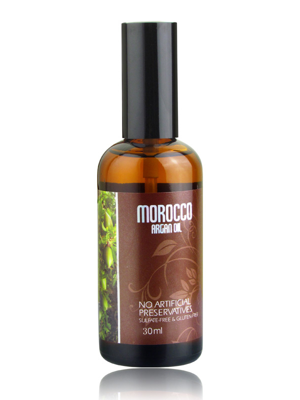 Morocco Argan Oil Масло арганы для волос, 30 млFS-00103 Morocco Argan Oil Масло арганы для волос, 30 млFS-00103Масло усиливает любой уход, делая волосы сильными и крепкими. Аргановое масло отлично усваивается волосами, не утяжеляя их, оказывает выраженное защитное действие, в том числе от ультрафиолета, быстро улучшает качество волос, даря им природную силу и сияющий блеск. Такое масло прекрасно дополнит любой уход, усилив действие маски или кондиционера, защитив волосы в процессе окрашивания и укладки. Активные ингредиенты и их эффект: Марокканское аргановое масло - равномерно покрывает волосы, не утяжеляя их и не оставляя липкости и жирного блеска. После использования волосы становятся более упругими, восстанавливаются изнутри, лучше расчесываются и надежно защищены от солнца, перепадов температур и других негативных воздействия. Масло семян льна является эффективной профилактикой выпадения волос, изнутри питает кожу головы и волосы, восполняет дефицит необходимых веществ. Благодаря льняному маслу снижается избыточное салоотделение, перхоть исчезает. Это масло усиливает и дополняет действие масла арганы и делает его максимально эффективным. Способ применения:Для увлажнения и питания волос и кожи головы разведите 5-10 капель масла в маске Morocco Argan Oil. Оставьте смесь на волосах на 5 минут и смойте водой.Для защиты во время окрашивания Вы можете добавить 5 капель масла Morocco Argan Oil непосредственно в краску и провести процедуру, как обычно.Для гладкости волос используйте масло в сочетании с кондиционером Morocco Argan Oil, добавив 5 капель масла прямо в кондиционер и оставив смесь на волосах на несколько минут.Для интенсивного блеска волос используйте неразбавленное масло – просто равномерно распределите масло Morocco Argan Oil по сухим волосам и не смывайте его.Для термозащиты волос нанесите на волосы небольшое количество масла, после чего проведите укладку плойкой, утюжком, феном или щипцами.Объем: 30 мл