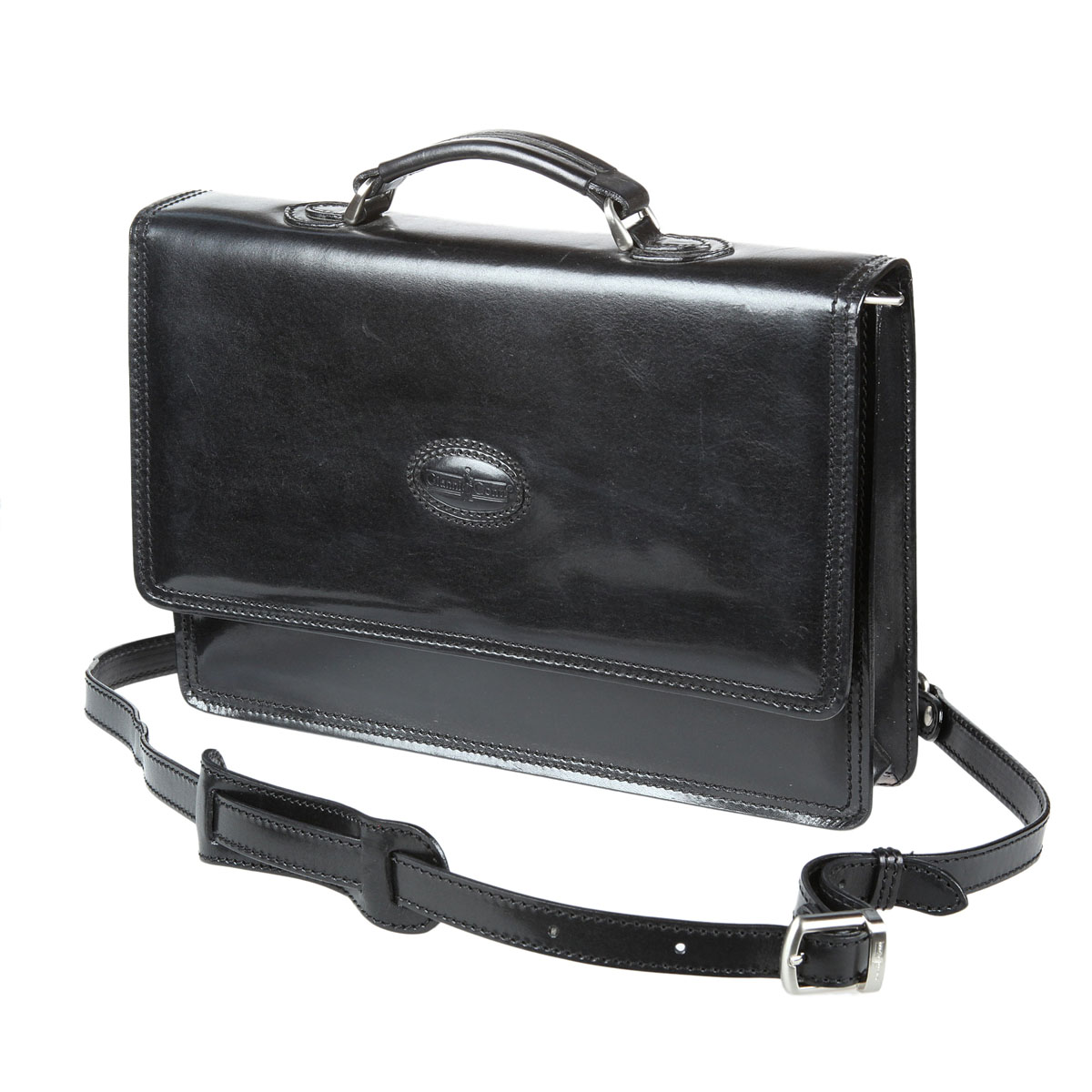 Портфель Gianni Conti муж., цвет: черный. 901040 blackKV996OPY/M Портфель Gianni Conti муж., цвет: черный. 901040 blackKV996OPY/Mзакрывается на магнитную кнопкуоснащен съемным регулируемым плечевым ремнем на карабинахвнутри три небольших отделав последнем на задней стенке карман для мобильного телефонатри кармашка для пластиковых картдва держателя для авторучеккарман для документов на молнииснаружи на передней стенке (под клапаном) два отдела для документов на молниидва кармашка для мелких предметов на молниина задней стенке карман для документов на молнии