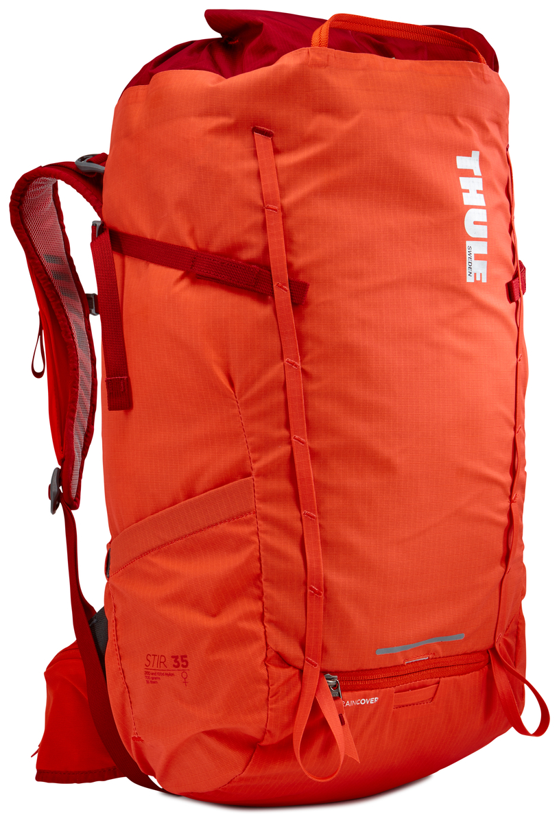 Рюкзак женский Thule Stir 35L, цвет: оранжевый, 35 л211403 Рюкзак женский Thule Stir 35L, цвет: оранжевый, 35 л211403Женский рюкзак для пеших путешествий Thule Stir с объемом 35 л. Благодаря простому и элегантному дизайну в сочетании с регулировкой рюкзака по спине, множеством легкодоступных карманов и дождевым чехлом этот рюкзак идеально подходит для более долгих дневных походов. Легкодоступная крышка с защитным откидным клапаном. Система StormGuard - это комбинация частичного дождевого чехла с водонепроницаемым нижним слоем для создания полностью защищенного от непогоды рюкзака. Конструкция StormGuard обеспечивает удобный доступ к снаряжению, препятствует проникновению влаги и более надежна, чем обычный дождевой чехол. Регулировка по спине в пределах 10 см обеспечивает идеальную посадку. Съемные поясной и нагрудный ремни для городского использования. Боковая молния для удобного доступа к снаряжению. Эластичный карман на плечевом ремне для хранения телефона и других небольших предметов. Точка крепления петли для фонаря и светоотражающий материал. Передний карман Shove-it Pocket для быстрого доступа. Две петли-крепления для треккинговых палок или ледорубов.