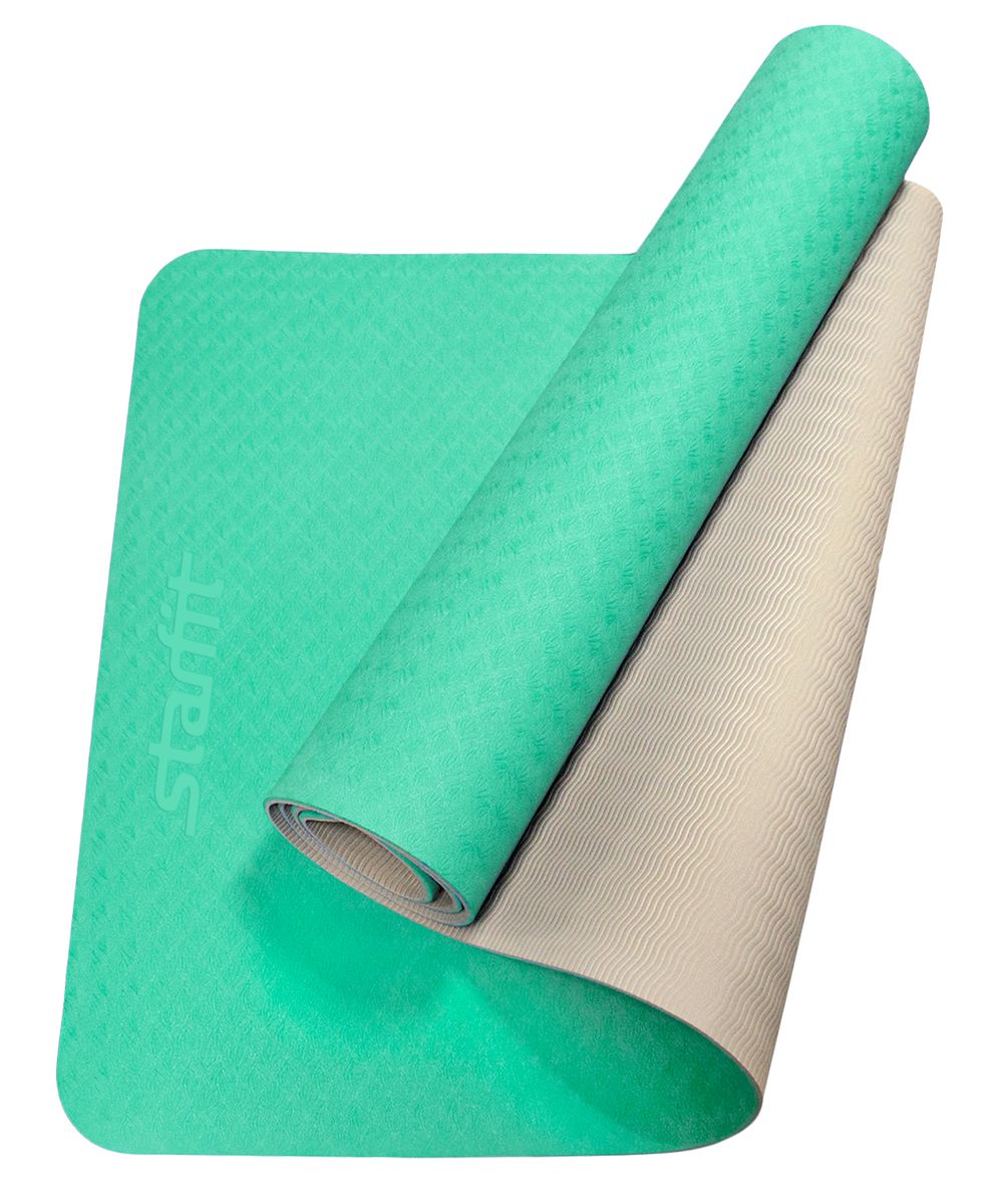 Коврик для йоги Starfit, цвет: мятный, серый,173 x 61 x 0,6 смFABLSEH10002 Коврик для йоги Starfit, цвет: мятный, серый,173 x 61 x 0,6 смFABLSEH10002Коврик для йоги FM-201 - это модель коврика Star Fit, выполненная из термопластичного эластомера, наиболее прочная и износостойкая, а также же имеет яркий и очень привлекательный внешний вид, поэтому она привлекает клиентов именно в сторону Star Fit.Коврики TPE Star Fit незаменимый аксессуар для любого спортсмена как во время тренировки, так и во время пре-стретчинга (растяжки до тренировки) и стретчинга (растяжки) после тренировки. Коврики TPE Star Fit используются в фитнесе, йоге, функциональном тренинге. Их используют спортсмены различных видов спорта в своем тренировочном процессе. Предпочтительно использовать без обуви. Если в обуви, то с мягкой подошвой, чтобы избежать разрыва поверхности коврика.Люди, занимающиеся медитацией, также делают выбор в пользу Star Fit. Характеристики:Тип: коврик для йоги и фитнесаМатериал: ТРЕ (Термопластичные эластомеры)Длина, см: 173Ширина, см: 61Толщина, см: 0,6Цвет: мятный, серыйКоличество в упаковке, шт: 1Производитель: КНР