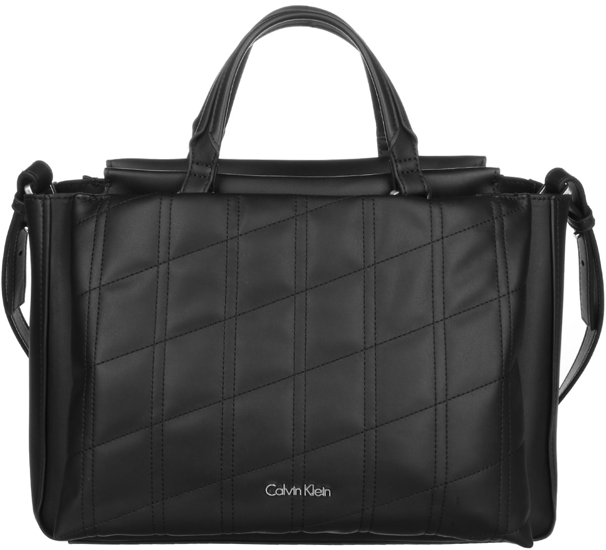 Сумка женская Calvin Klein Jeans, цвет: черный. K60K602088_001071069с-2 Сумка женская Calvin Klein Jeans, цвет: черный. K60K602088_001071069с-2Стильная сумка Calvin Klein Jeans выполнена из полиуретана. Изделие содержит одно большое отделение, которое закрывается на застежку-молнию. Внутри сумки размещен один накладной карман на застежке-молнии. Сумка оснащена плечевым ремнем регулируемой длины. Снаружи спереди и сзади сумка оснащена большими накладными карманами на магнитных замках. Оформлена модель металлической пластиной с названием бренда и небольшим брелоком. В комплекте с изделием поставляется чехол для хранения.