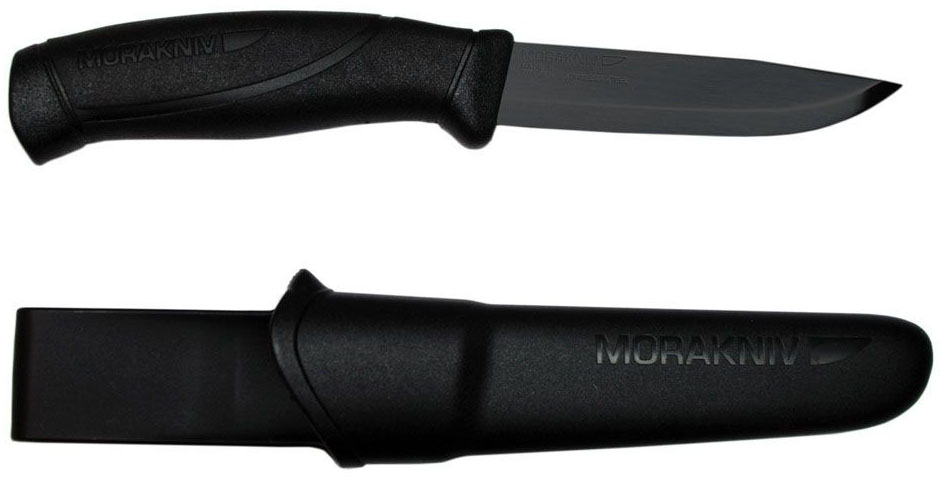 Нож туристический Morakniv Companion Black Blade, цвет: черный, длина лезвия 10,4 смG7413P-BK-WS Нож туристический Morakniv Companion Black Blade, цвет: черный, длина лезвия 10,4 смG7413P-BK-WSMorakniv Companion Black Blade - это многоцелевой нож скандинавского типа. Он вызывает неподдельную радость от качества изготовления и легкости работы таким доступным инструментом. В ноже есть все необходимое, что наиболее часто бывает нужно при простой работе: отличная геометрия и оптимальная длина лезвия, удобство рукояти и ножен, простота в уходе и неприхотливость.Morakniv Companion Black Blade с клинком из нержавеющей стали - наиболее оптимальный выбор среди разнообразия моделей, ведь такой клинок требует наименьшего внимания и совершенно неприхотлив. Рукоять ножа выполнена из резинопластика, она имеет очень хорошее сцепление с ладонью и избегает проскальзывания в руке. Ее легко удерживать благодаря удобной форме и плавным изгибам. Простые и надежные ножны обеспечивают хорошее удержание ножа. Благодаря поясной петле их можно носить на ремне.Общая длина ножа: 22,4 см.