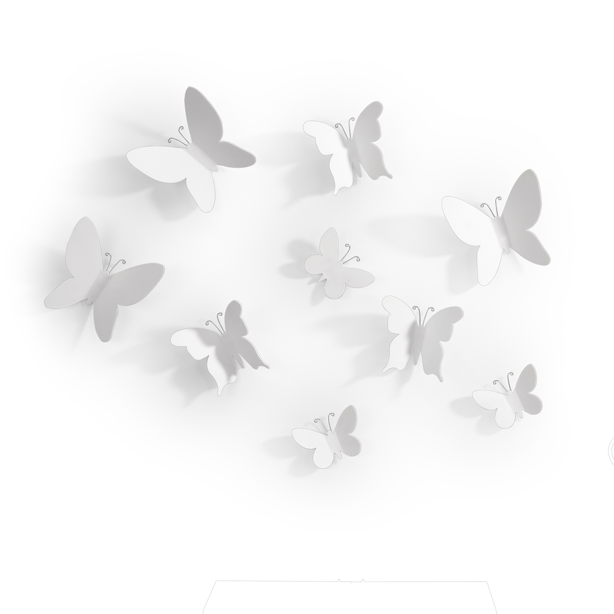 Декоративное украшение Umbra Mariposa, настенное, цвет: белый, 9 шт300164_черный, кошки Декоративное украшение Umbra Mariposa, настенное, цвет: белый, 9 шт300164_черный, кошкиДобавьте интерьеру весеннего настроения! Набор из 9 летящих бабочек добавит комнате легкости и превратит любую скучную стену в уникально декорированное пространство. Идеально подойдет для украшения спальни, гостиной или детской комнаты. Крепятся бабочки на специальный двусторонний скотч, который не оставляет следов на стене (идет в комплекте).Три размера: от самой маленькой бабочки 5 х 6 х 1 см до 9 х 10 х 3 см.