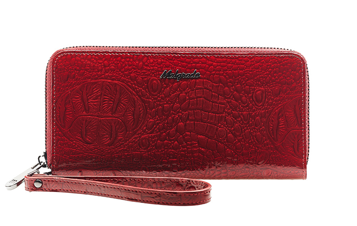 Кошелек Malgrado, цвет: красный. 73005-01701BM8434-58AE Кошелек Malgrado, цвет: красный. 73005-01701BM8434-58AEСтильный кошелек Malgrado изготовлен из лаковой натуральной кожи красного цвета с тиснением под рептилию и закрывается на молнию. У кошелька четыре основных отделения, одно из них на молнии. В кошельке есть по четыре кармашка на боковых стенках для карточек, визиток, кредиток и два кармашка побольше, в которые можно положить пропуск, проездной билет или фотографию. Закрывается на металлическую молнию. В комплект так же входит удобный кожаный ремешок.